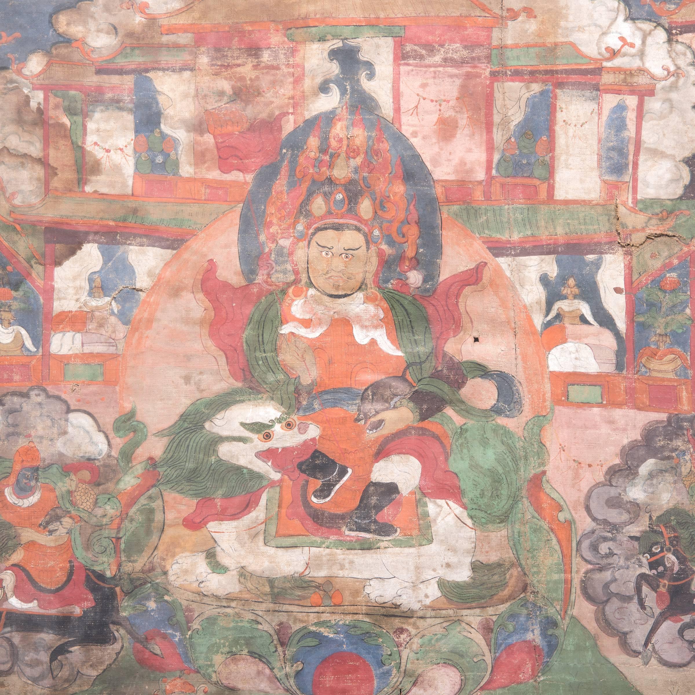 Thangkas are devotional paintings displayed by Buddhists in monasteries, temples, and even their homes. This 19th-century Tibetan Thangka is rich with historical figures and symbolism arranged around the Viashravana in the painting's center. This
