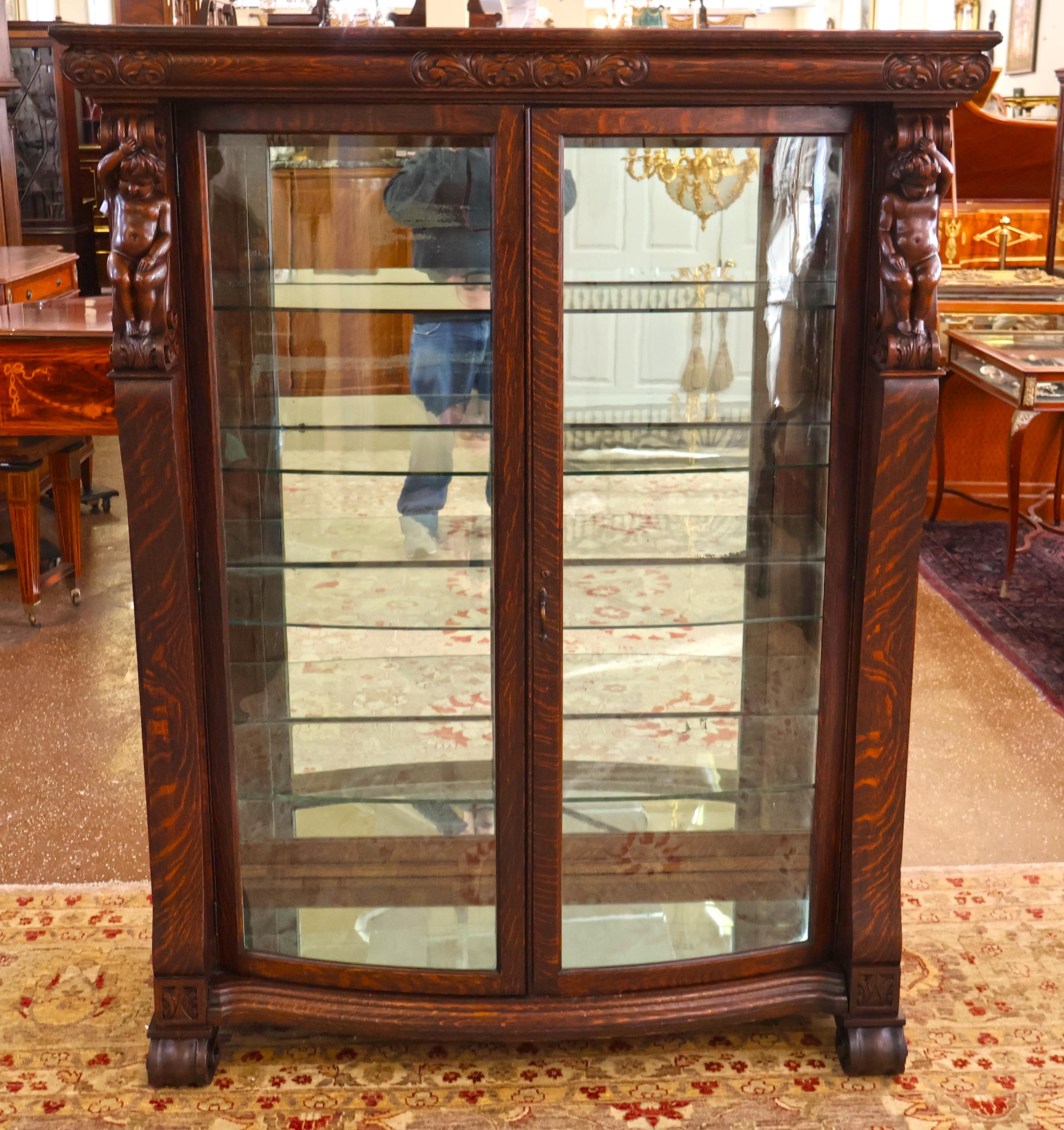 ​19th Century Tiger Oak Figural Carved Curio China Display Cabinet Attr RJ Horner

Dimensions : 67.5