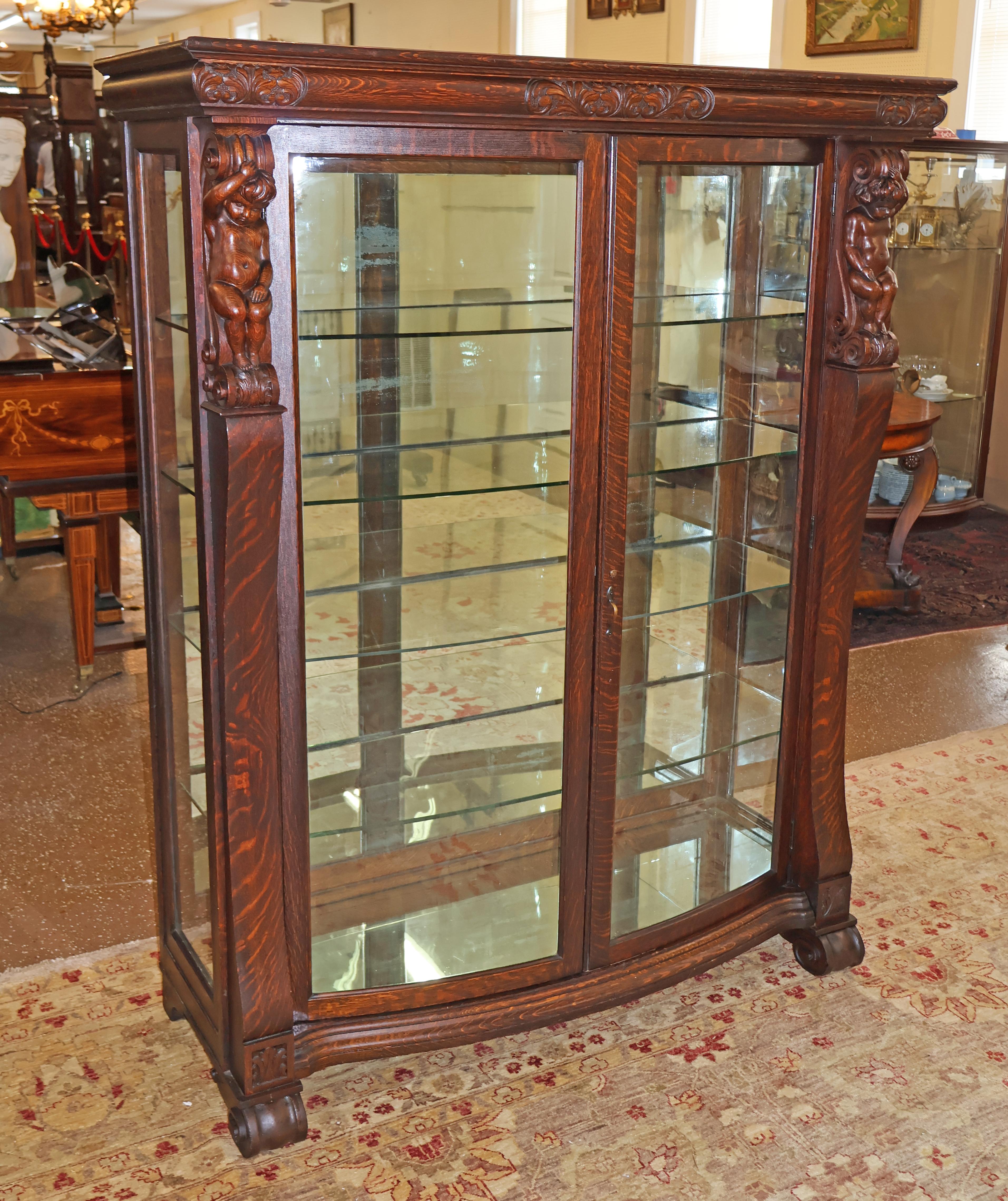 American 19th Century Tiger Oak Figural Carved Curio China Display Cabinet Attr RJ Horner For Sale