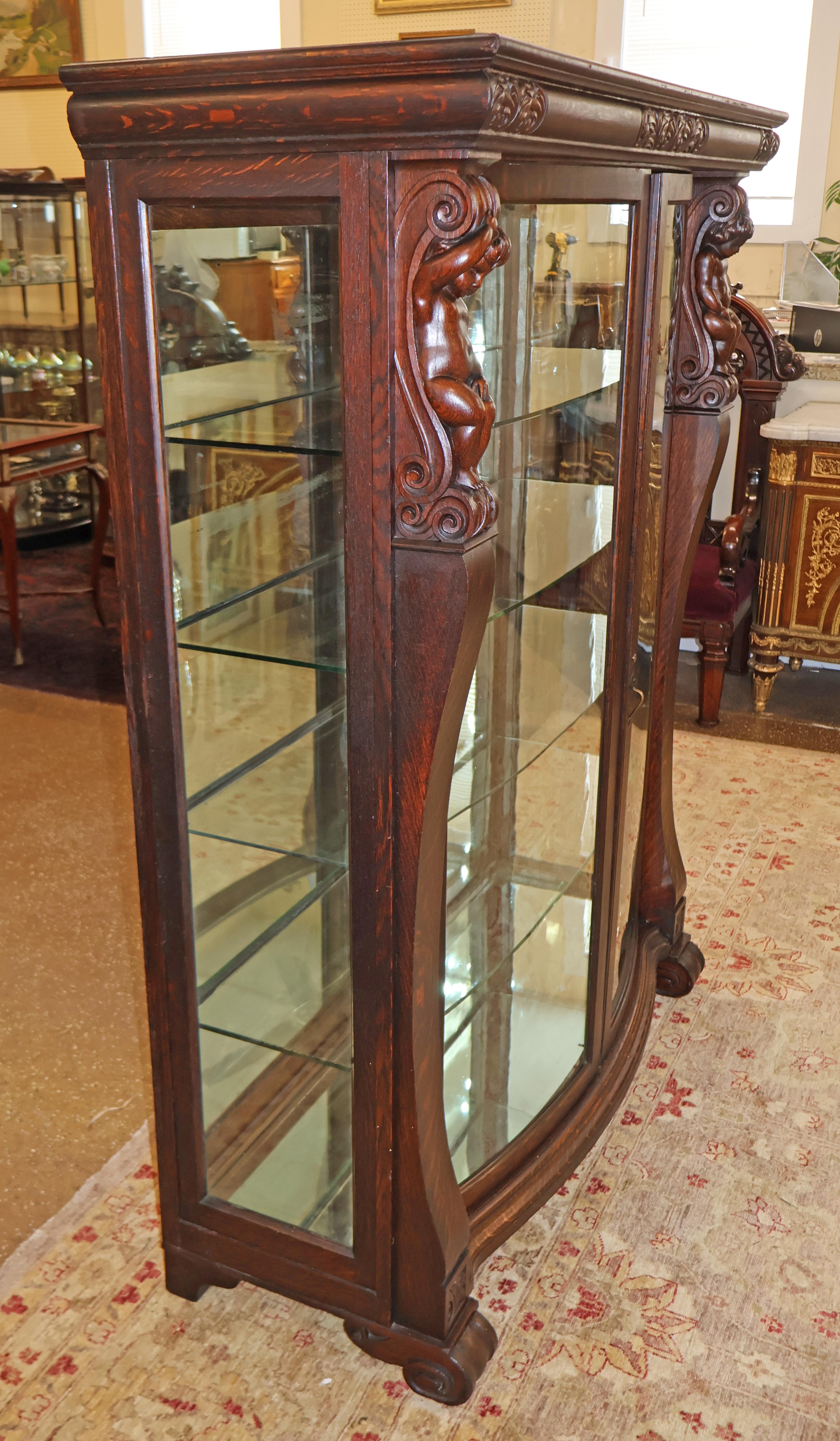 19th Century Tiger Oak Figural Carved Curio China Display Cabinet Attr RJ Horner In Good Condition For Sale In Long Branch, NJ