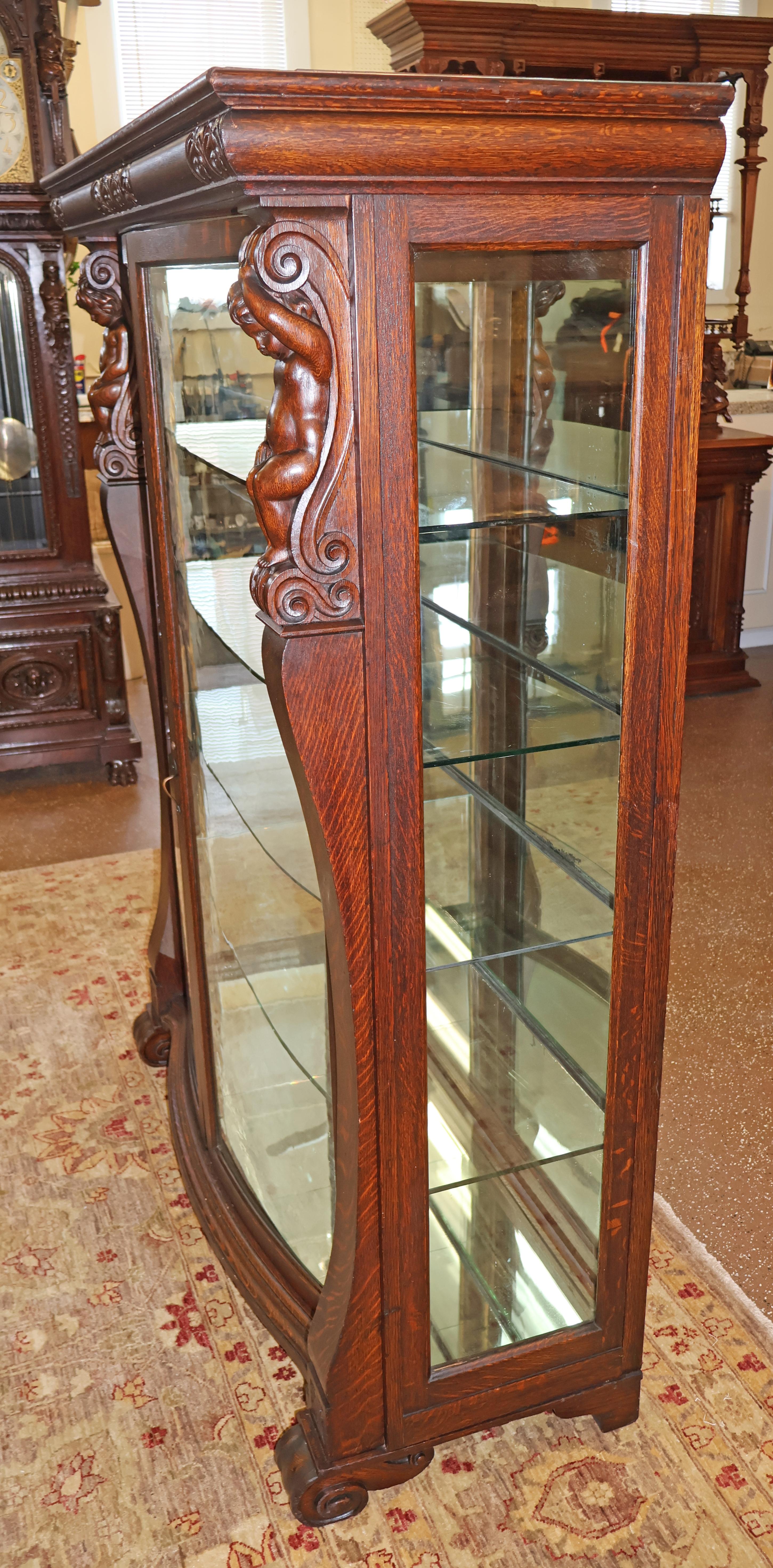 Late 19th Century 19th Century Tiger Oak Figural Carved Curio China Display Cabinet Attr RJ Horner For Sale
