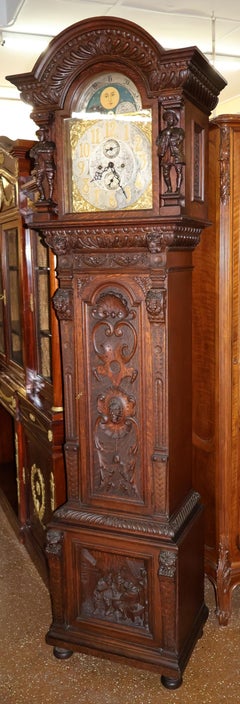 ​​19th Century Tiger Oak Figural Carved Tall Case Grandfather Clock W&H Movement
