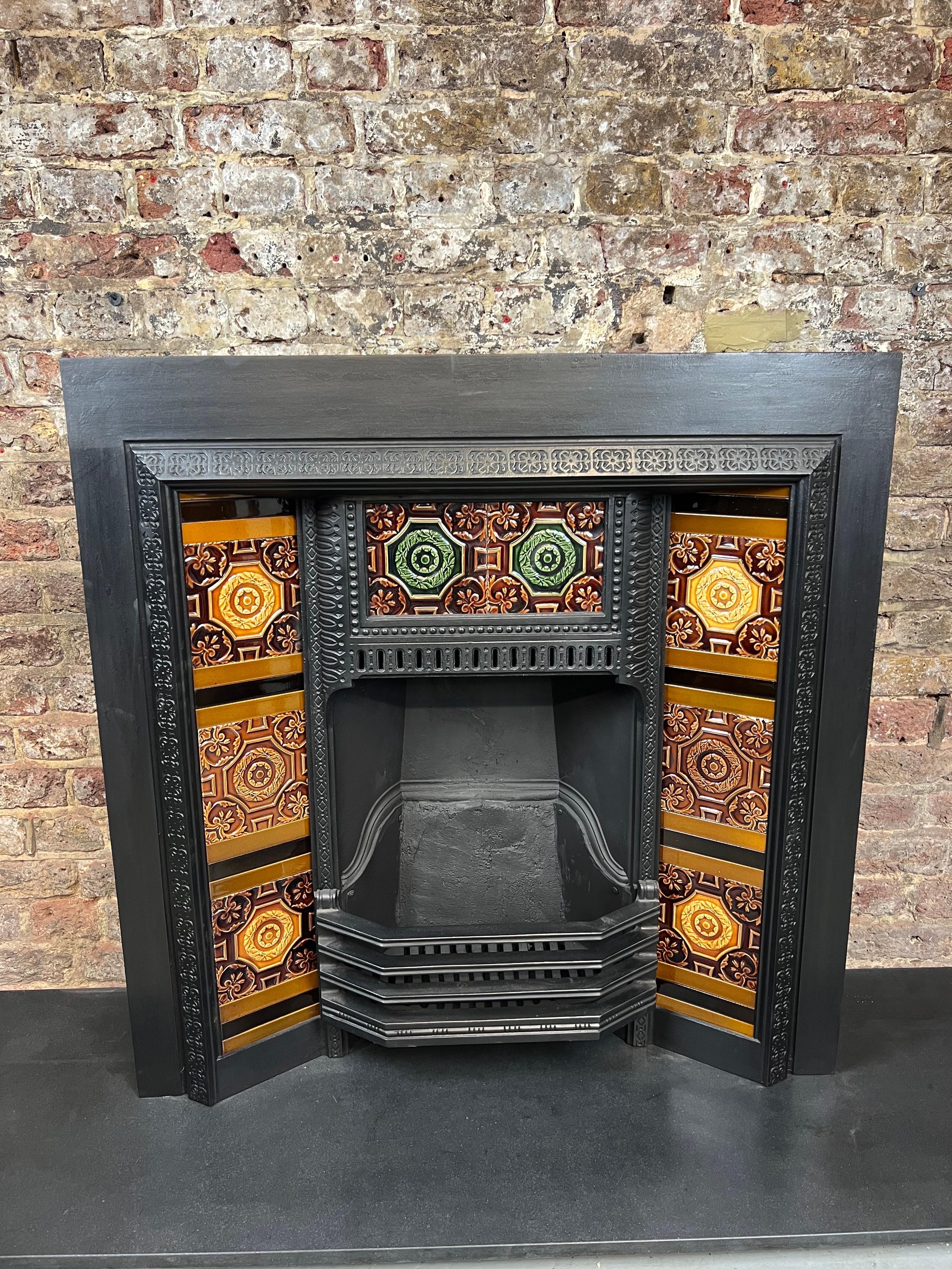 19th Century Tiled Cast-iron Fireplace Insert.
A Classic Example Of A Very Fine Victorian & English Made Cast-iron Fireplace With Its Original English Made Tiles. (Standard Set of Ten).
This Fireplace Was Recently Salvaged From A Large London Town