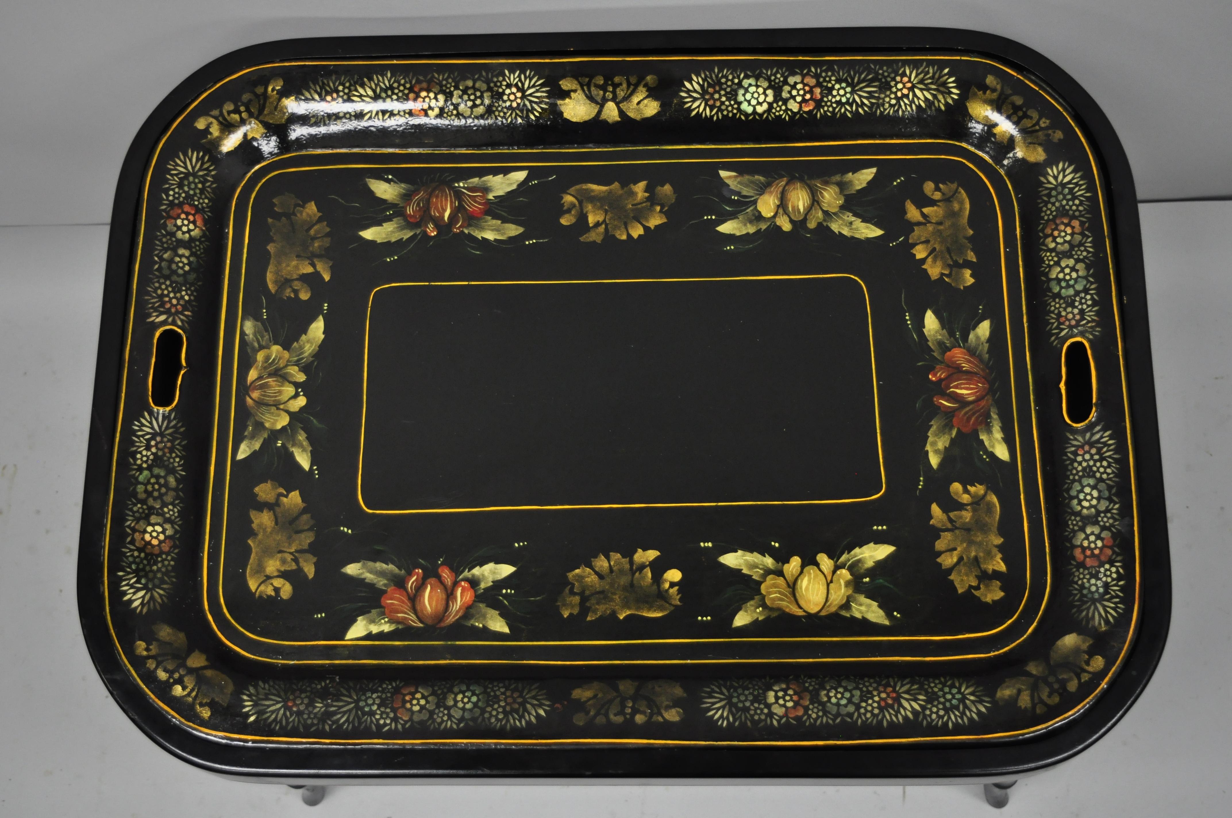 19th century tole metal serving tray with black faux bamboo coffee table base. Item features tray, circa 1850, custom base circa late 20th century. Tray signed to underside 