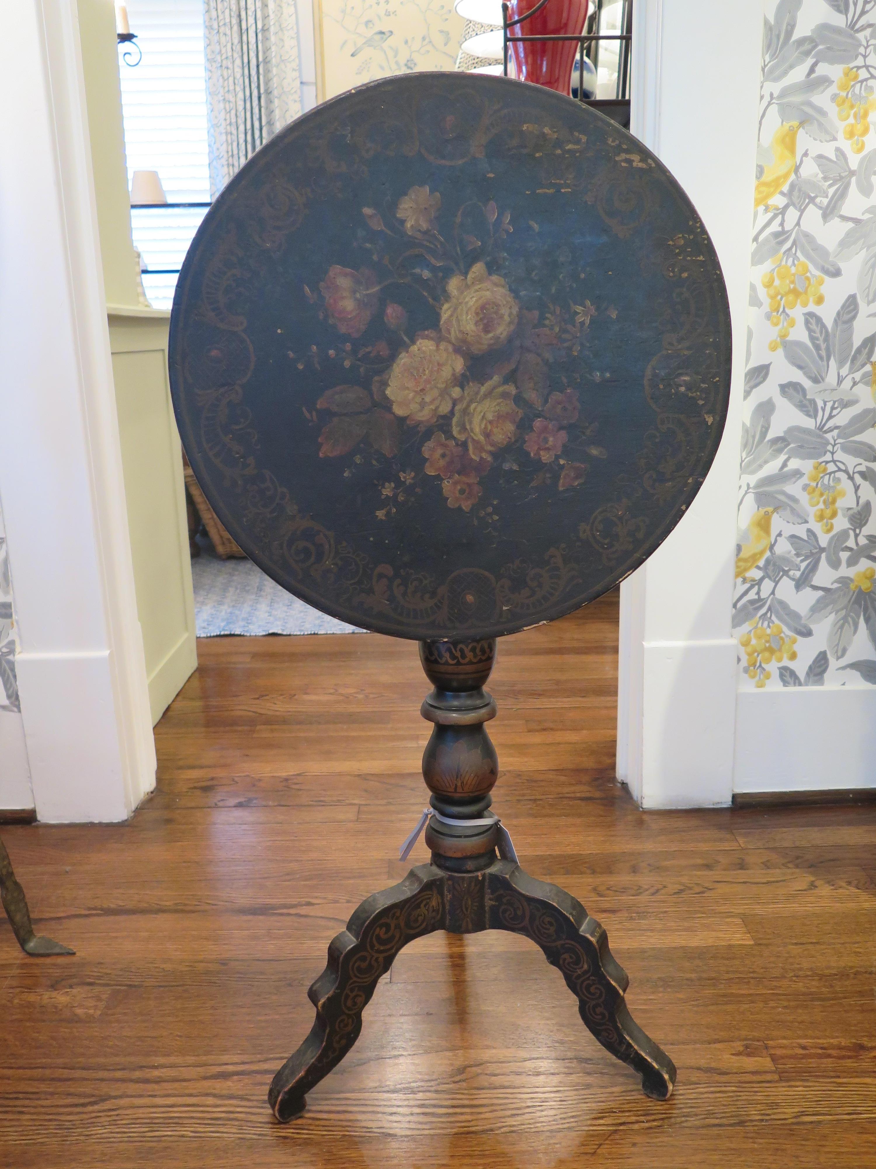 19th century tole tilt-top parlor table with beautiful painted florals and border detail.