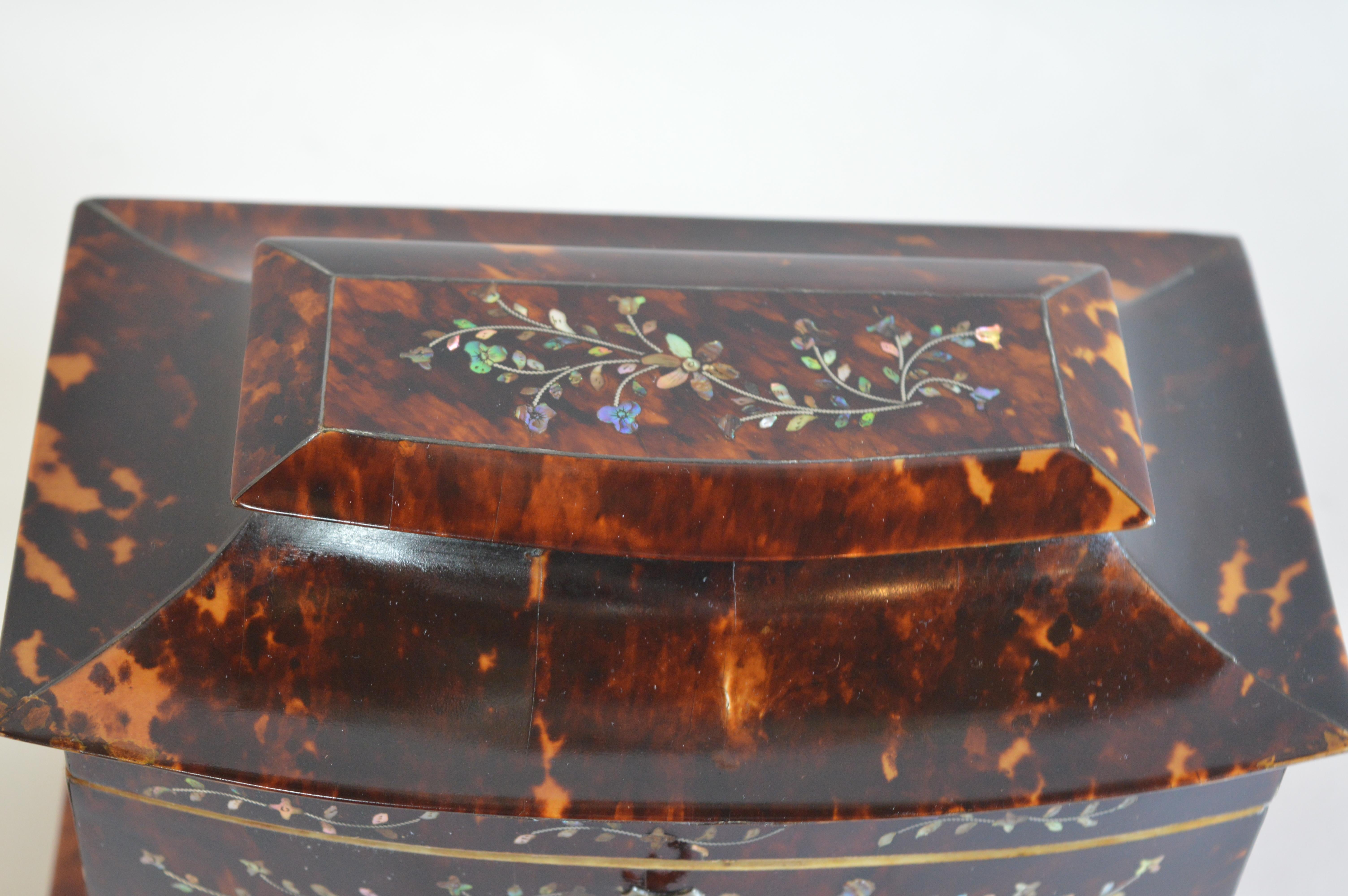 19th century tortoiseshell and mother of pearl floral inlaid tea caddy.