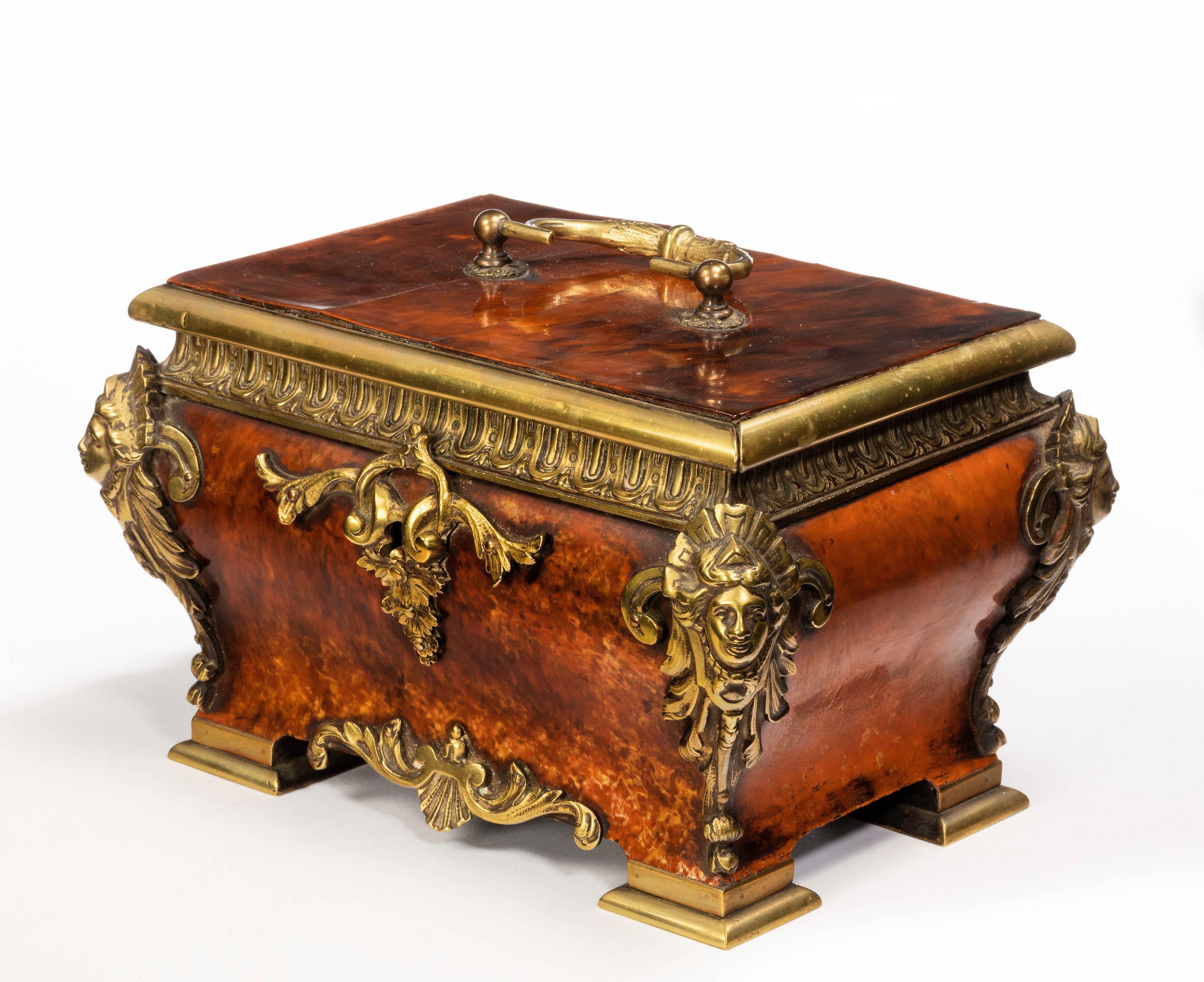 An exceptionally fine tortoiseshell and gilt bronze casket of waisted Bombay form. With original gilt bronze mounts all now patinated. In a quite exceptional condition.
  
