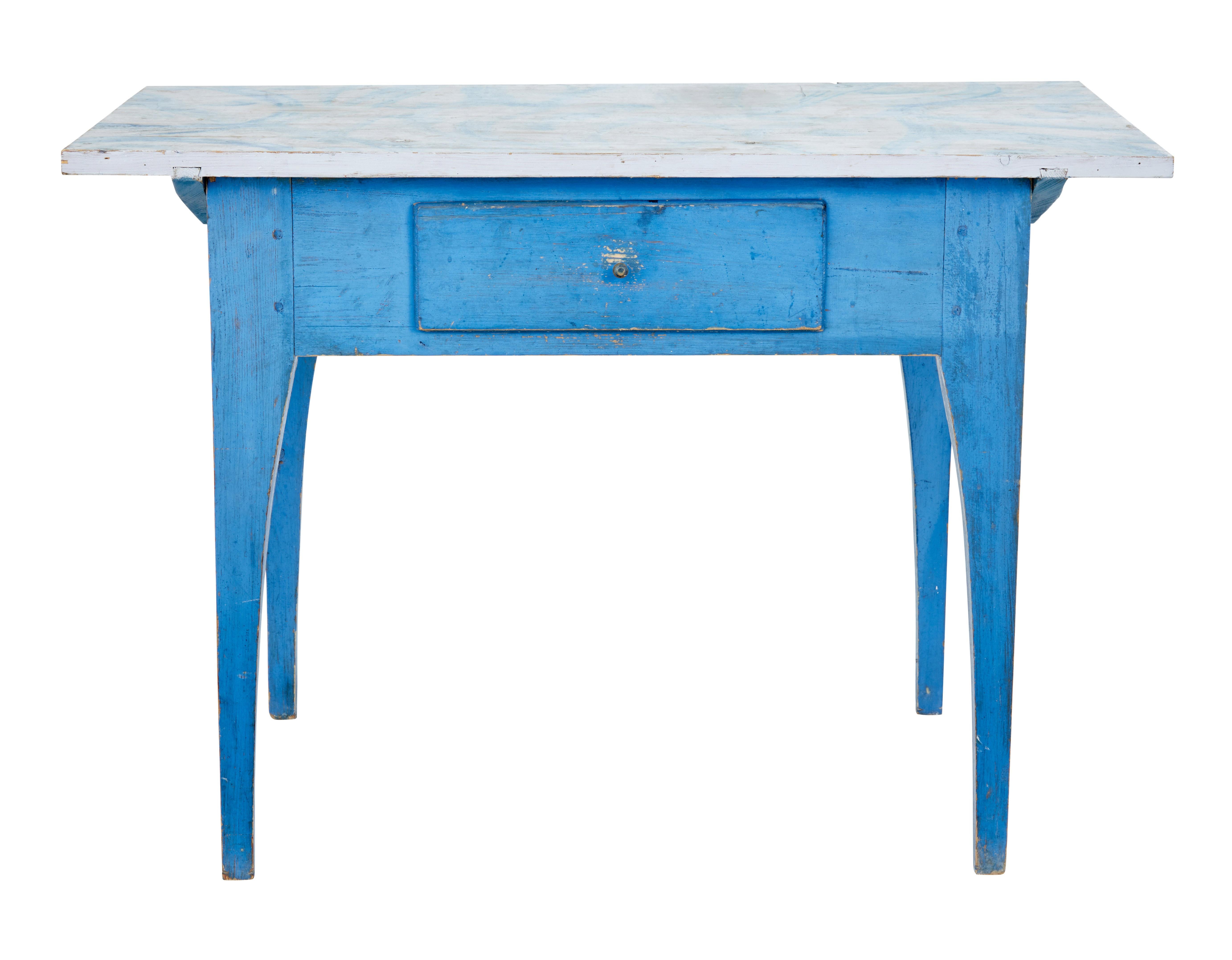 Here we offer a functional piece of 19th century traditional Swedish furniture, circa 1890.

Multi purpose table which could serve as a side table, occasional desk or kitchen table.

Traditionally hand painted top surface of grey and blue in a