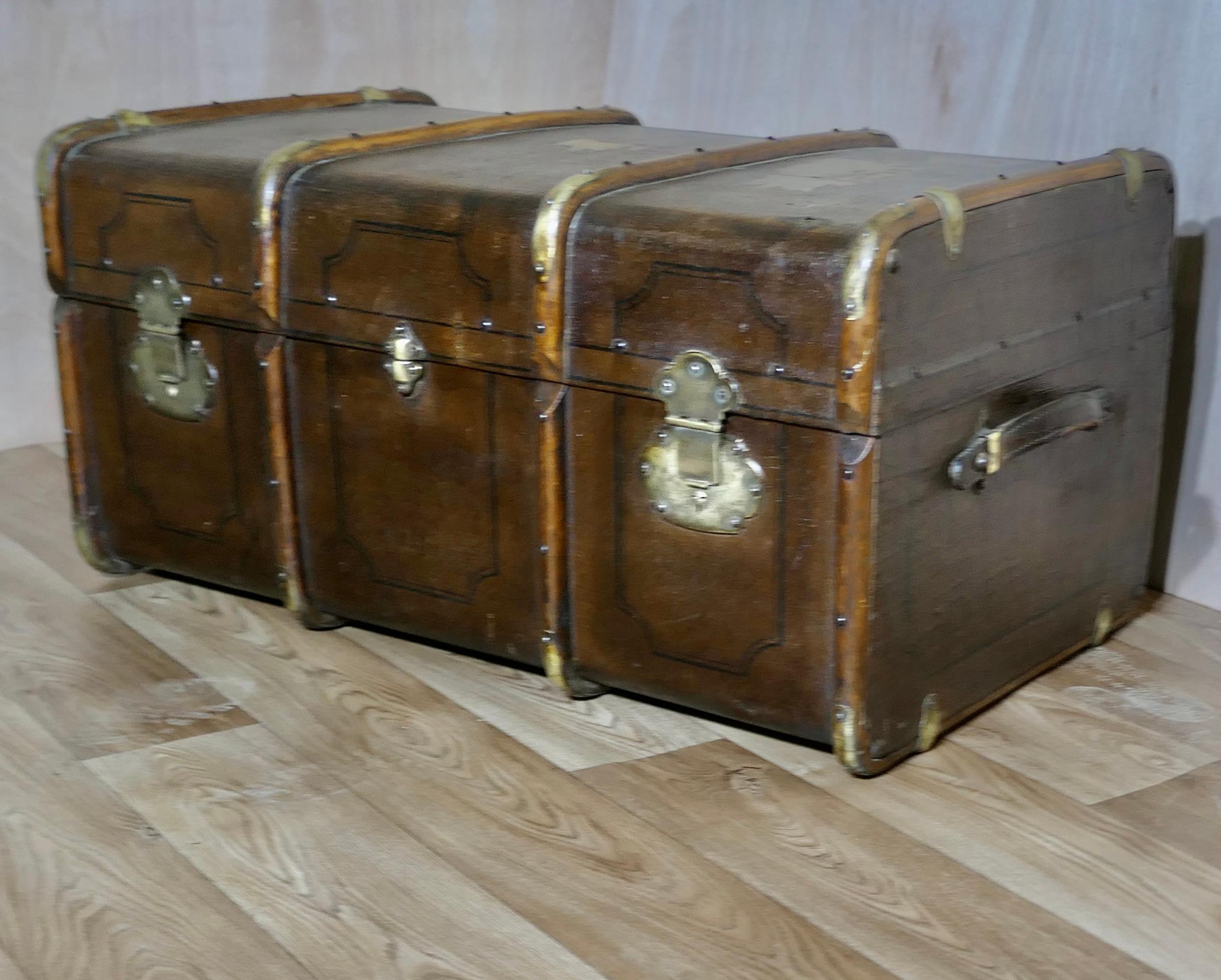 19th Century  Travel Chest or Steamer Trunk,  

A very useful decorative travel trunk, the Trunk is covered in canvas with a painted design, over this there is oak and brass banding.
 
The trunk is sturdy it has brass catches these work but we do