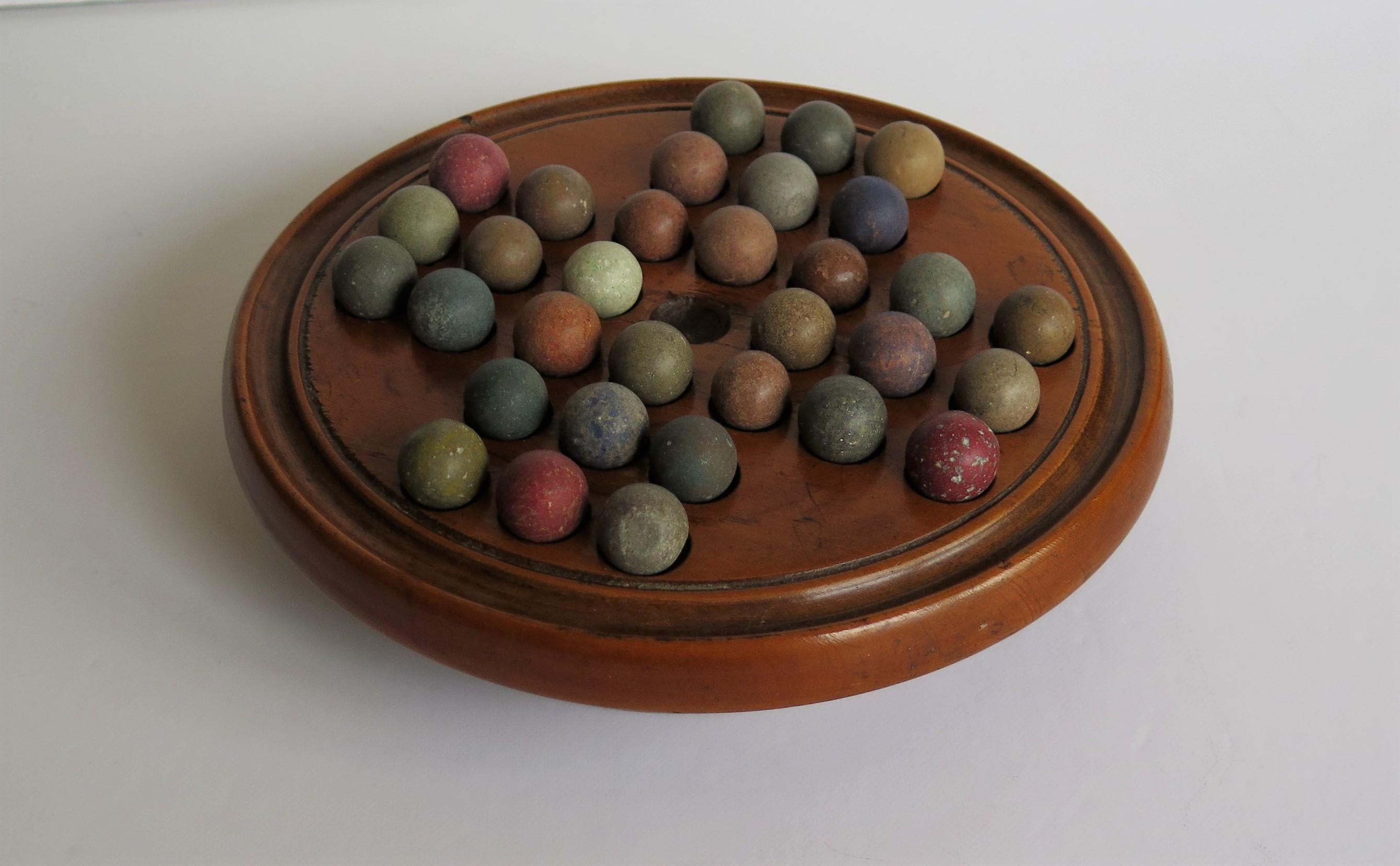 Turned 19th Century Travelling Marble Solitaire Game with 32 Handmade Clay Marbles