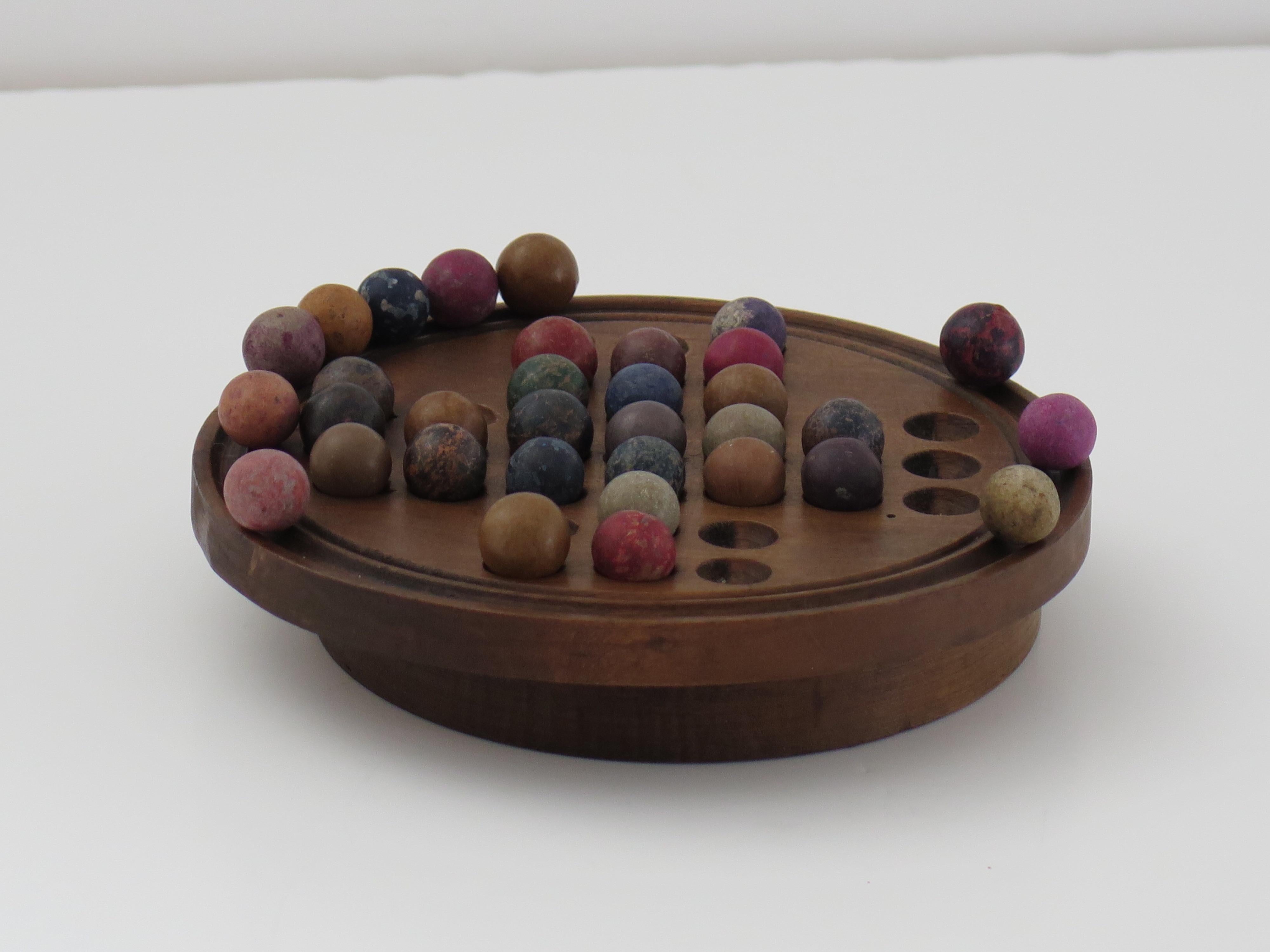 Victorian 19th Century Travelling Marble Solitaire Game with 33 Handmade Clay Marbles
