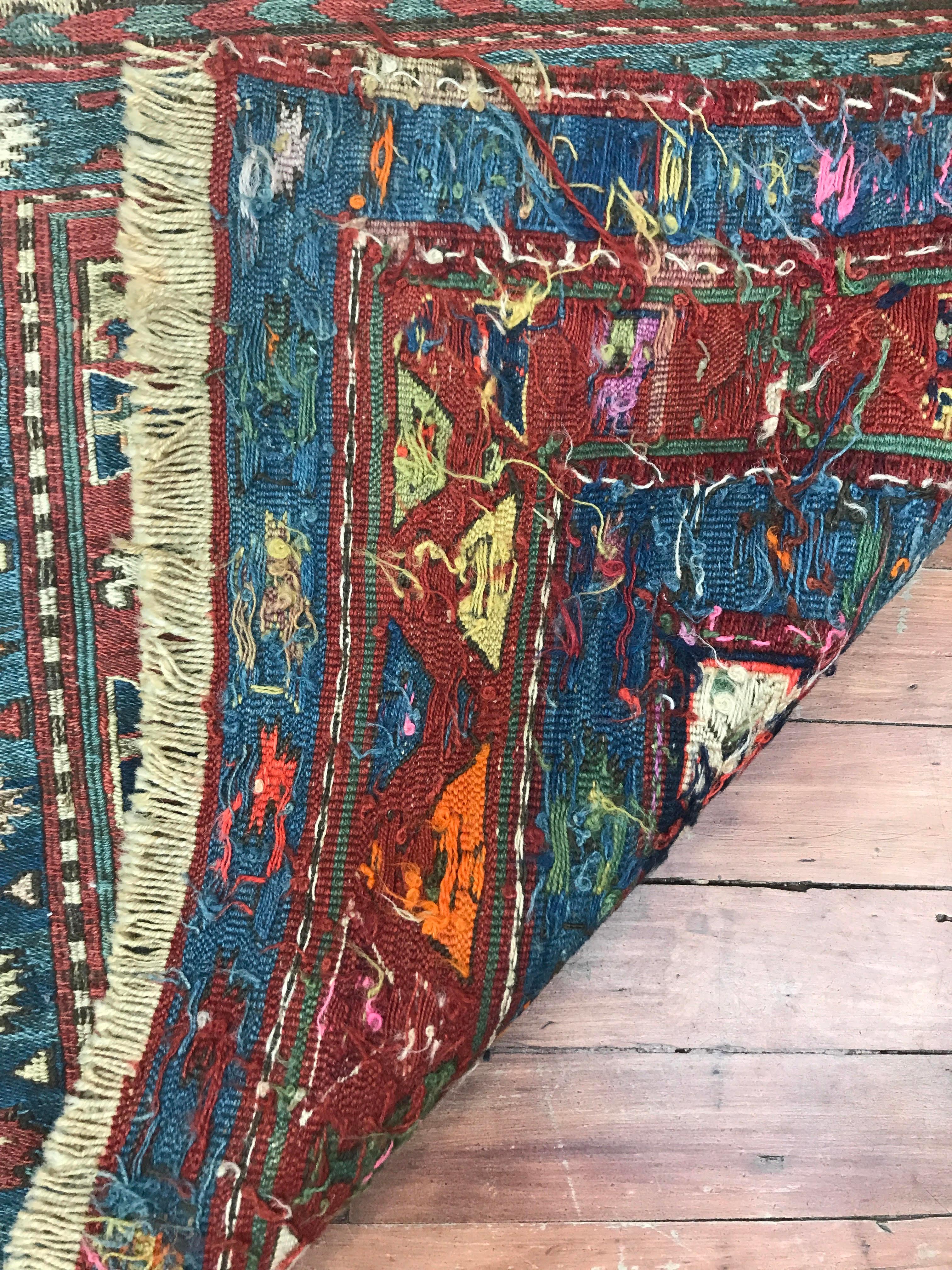 19th century Persian Soumak soumac tribal rug rug. Aqua, Teal, soft red, and cream accents

Measures: 1'7'' x 1'9''.