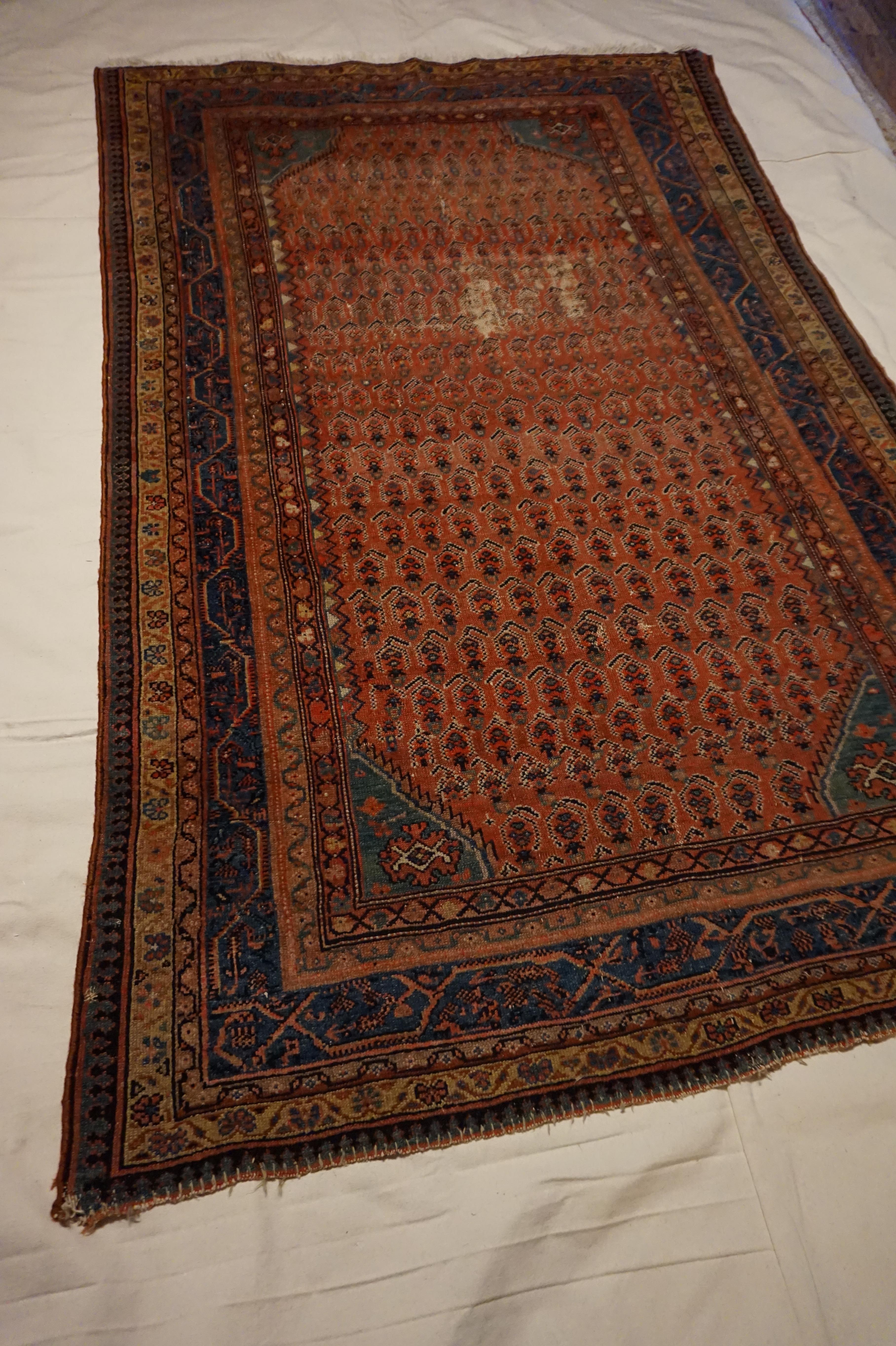 Handgeknüpfter Boteh-Paisley-Teppich aus dem 19. Jahrhundert in Rosttönen (Stammeskunst) im Angebot