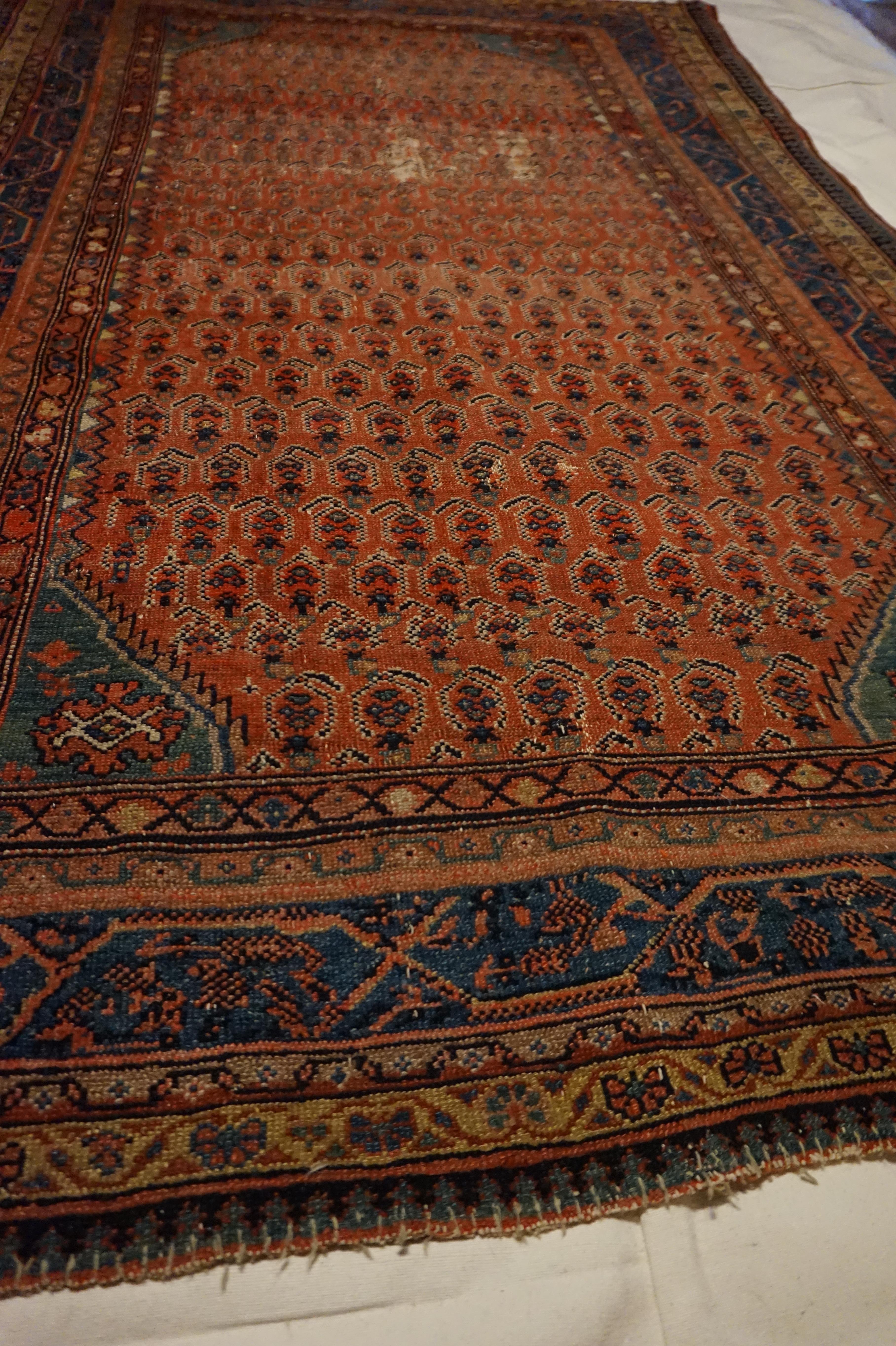 19th Century Tribal Boteh Paisley Hand-knotted Rug In Rust Hues In Good Condition For Sale In Vancouver, British Columbia