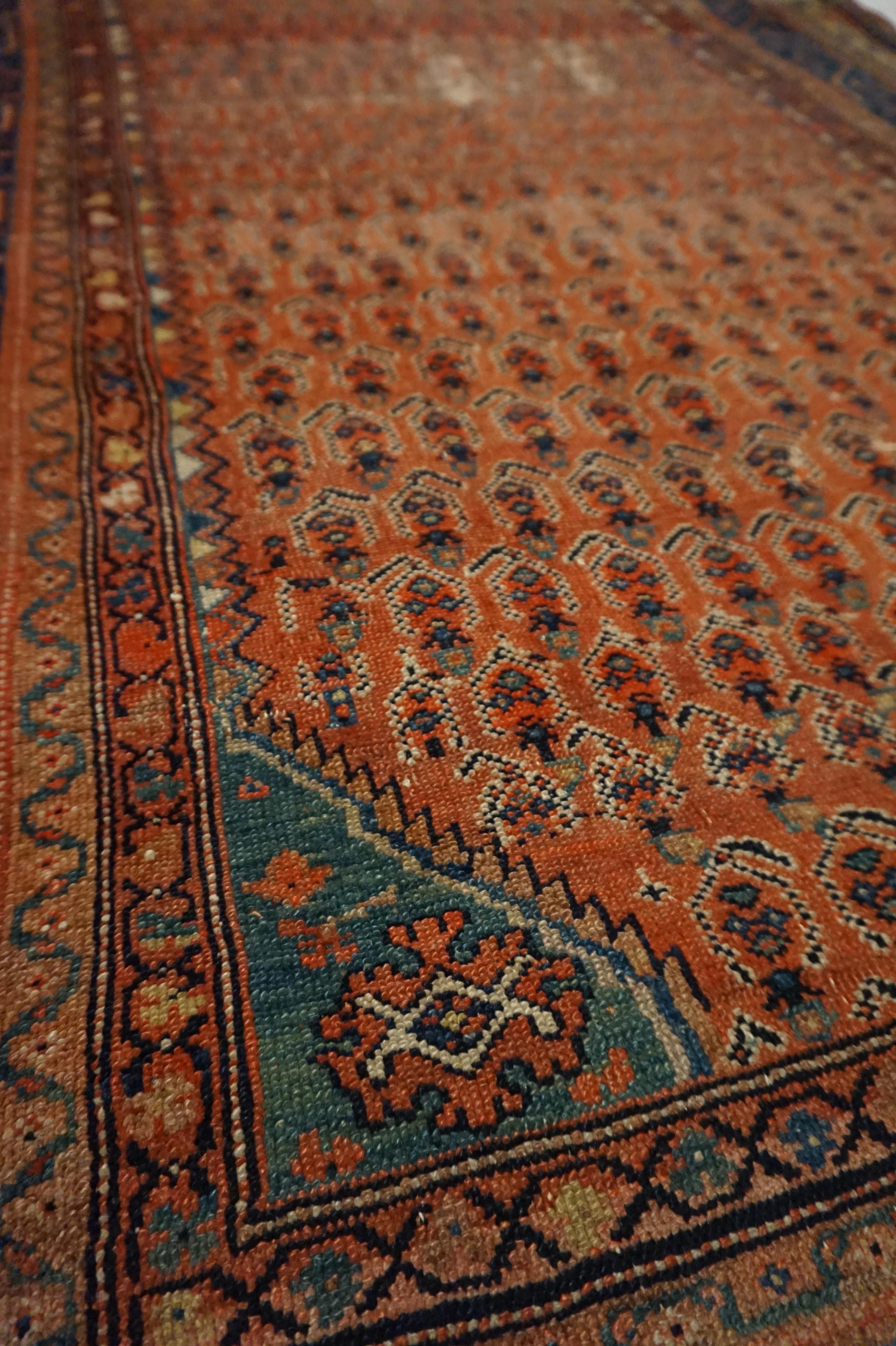 Late 19th Century 19th Century Tribal Boteh Paisley Hand-knotted Rug In Rust Hues For Sale