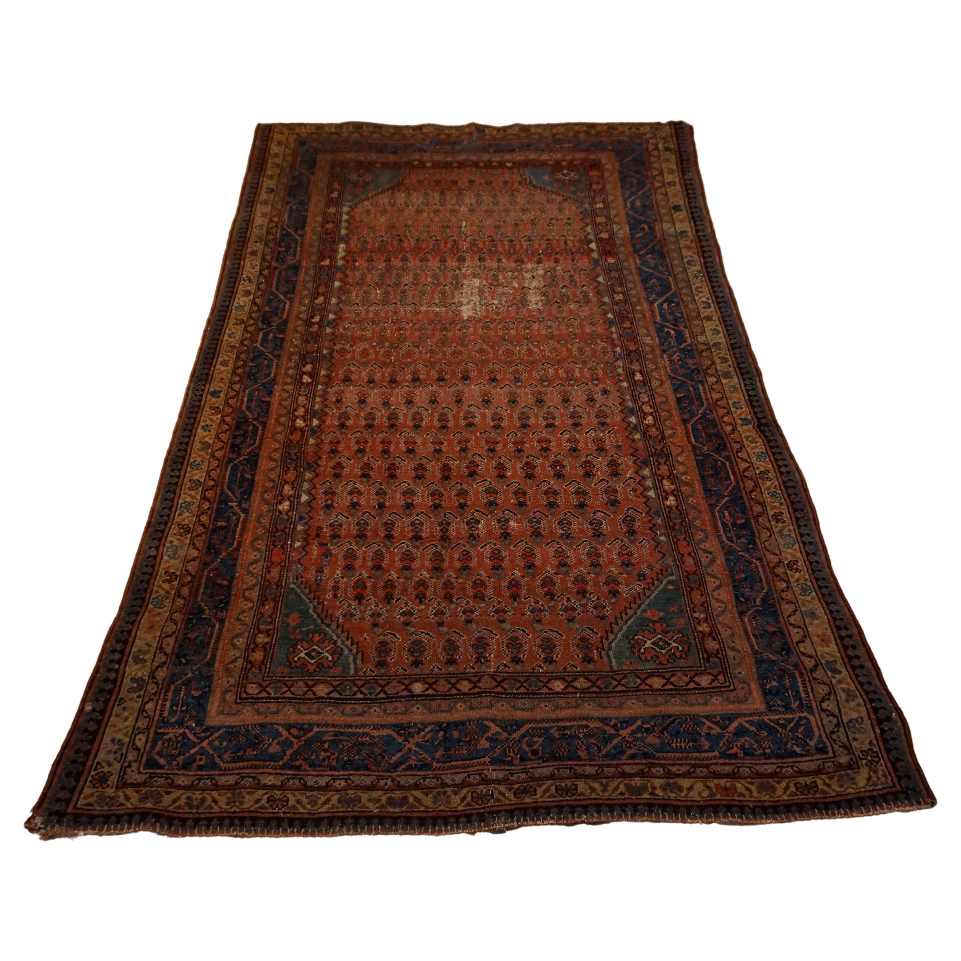 19th Century Tribal Boteh Paisley Hand-knotted Rug In Rust Hues For Sale