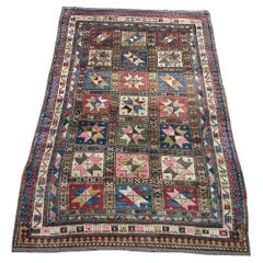 Tapis tribal caucasien du 19e siècle