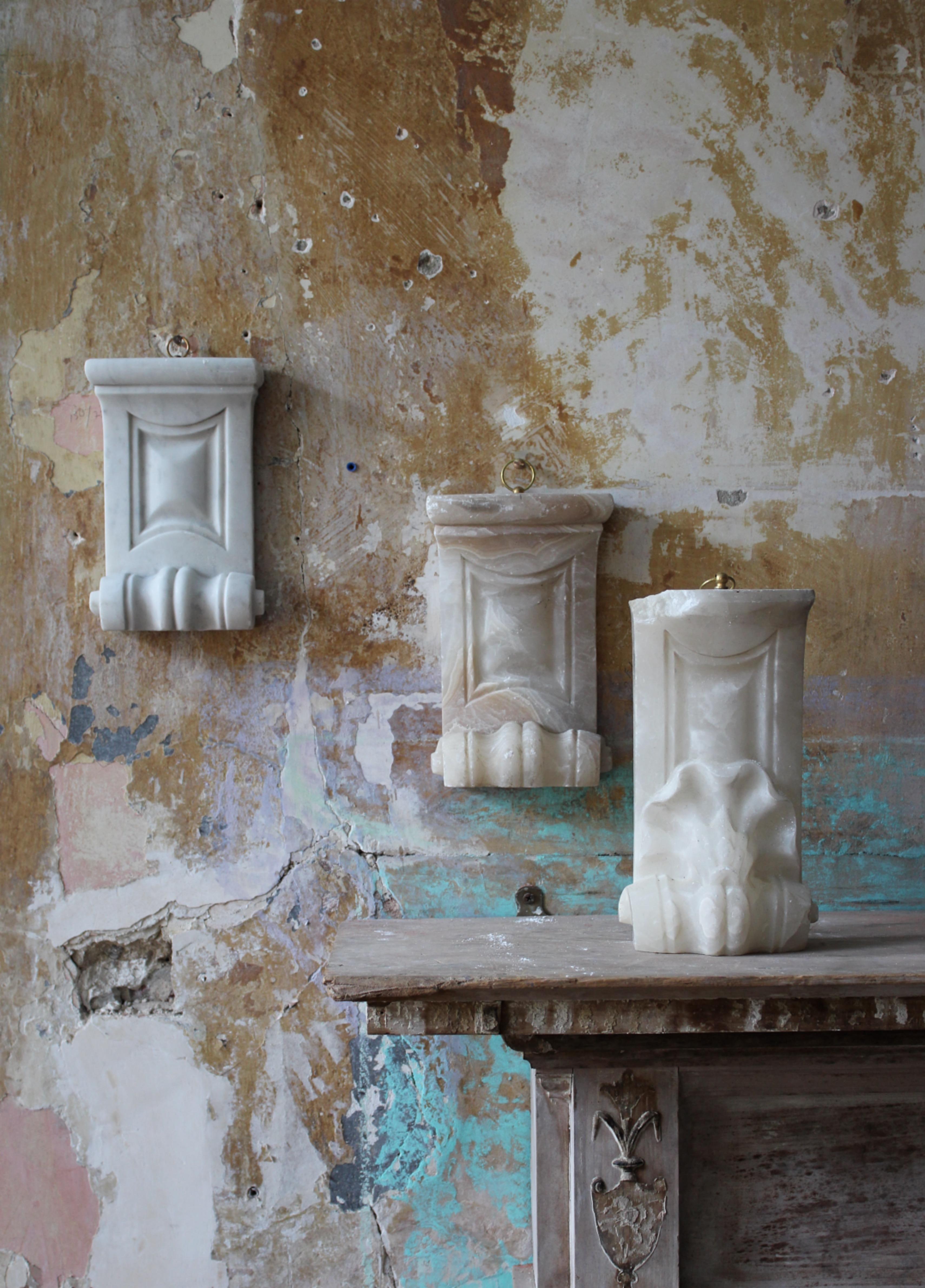 19th century collection of 3 hand carved corbels. two are alabaster and the other marble all with similar organic following decorations and previously part of larger interior architectural feature or fireplace

The sections are extremely well