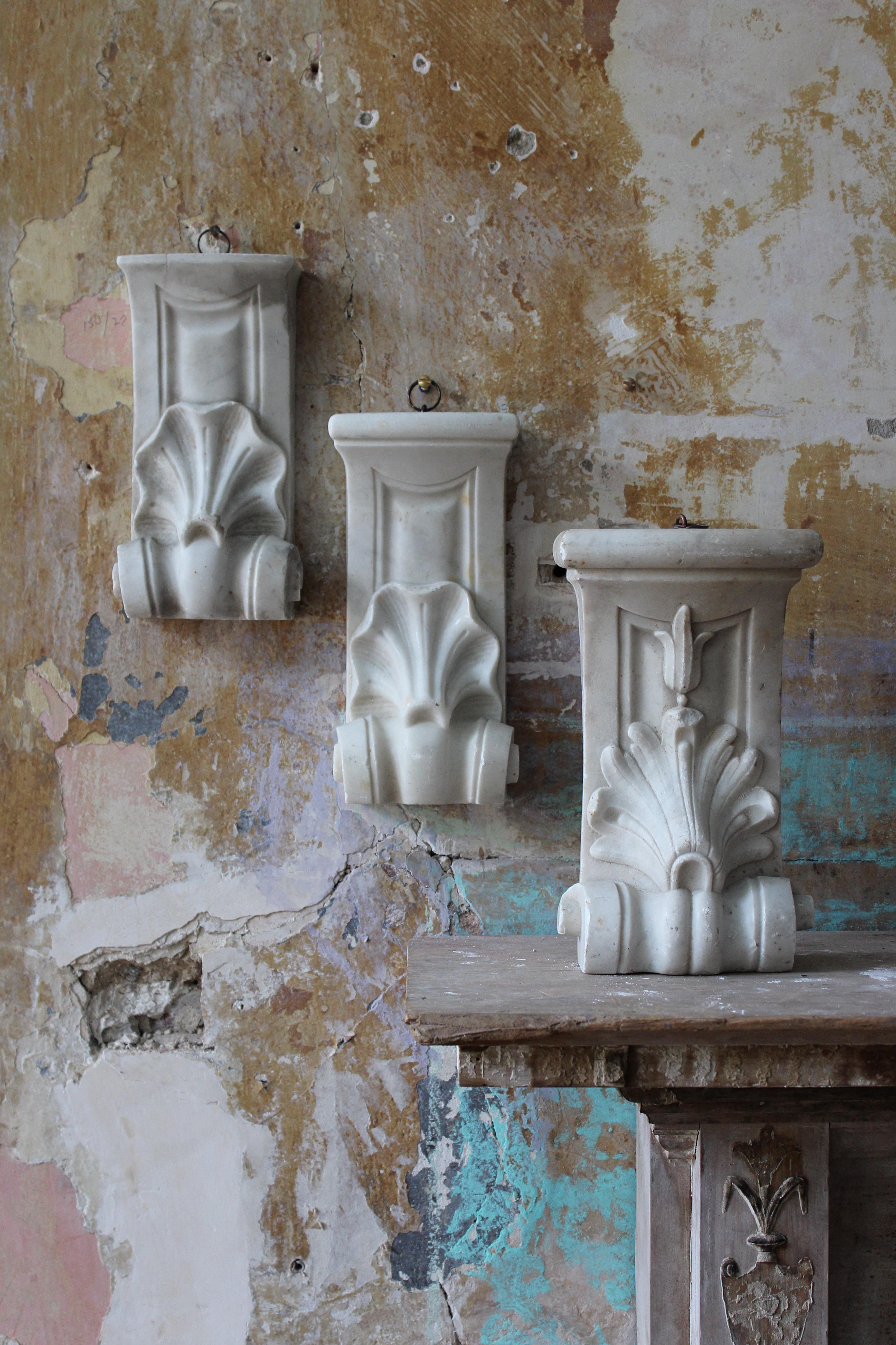 19th century trio of hand carved marble corbels, all with similar organic following decorations and previously part of larger interior architectural feature or fireplace

The sections are extremely well carved, crisp and have a good decorative
