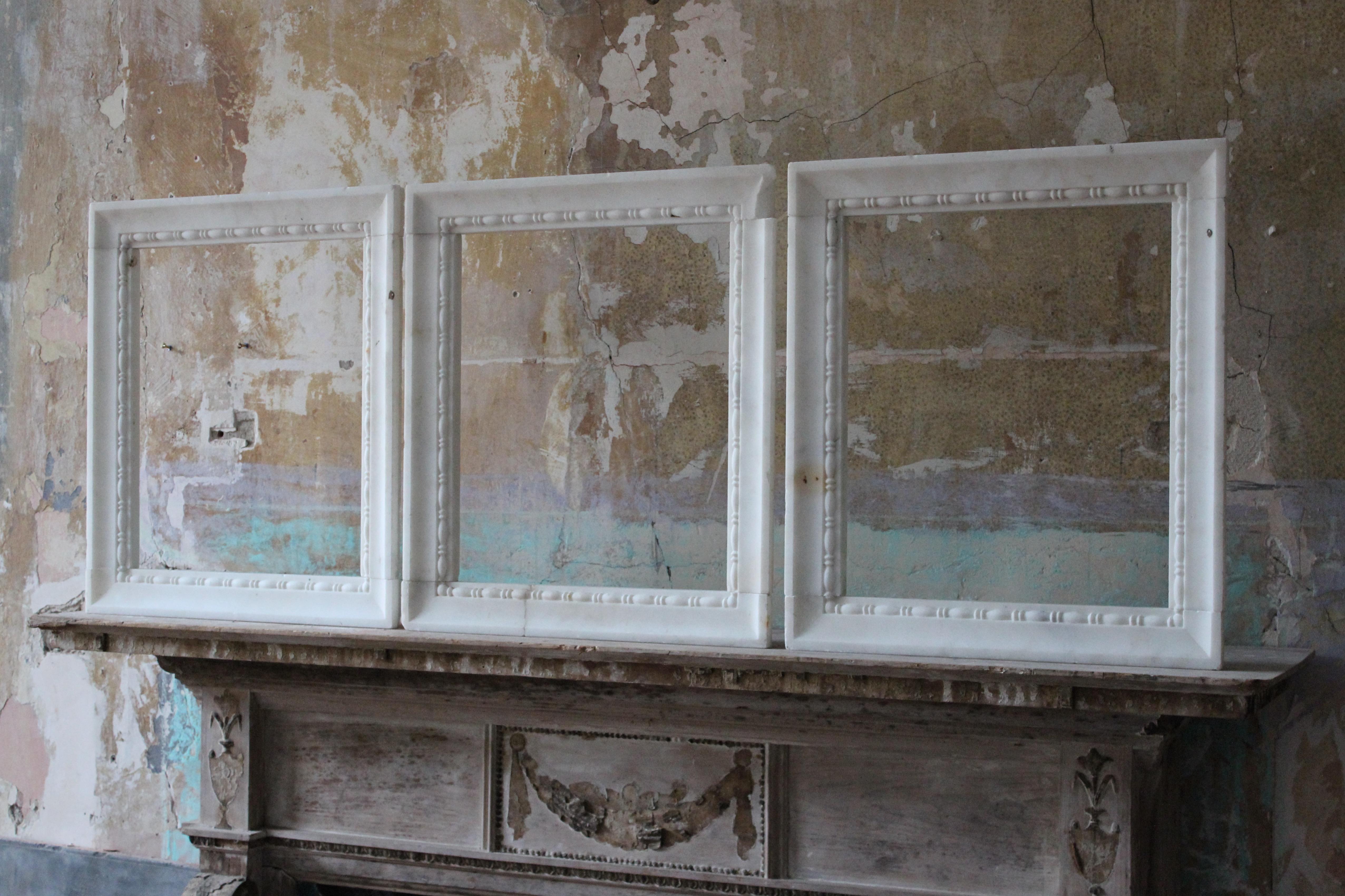 Mid 19th century trio of hand carved marble frames, all with balustrade border decorations previously part of larger interior architectural feature

The sections are extremely well carved, crisp and have a good decorative patina, some minor nibbles