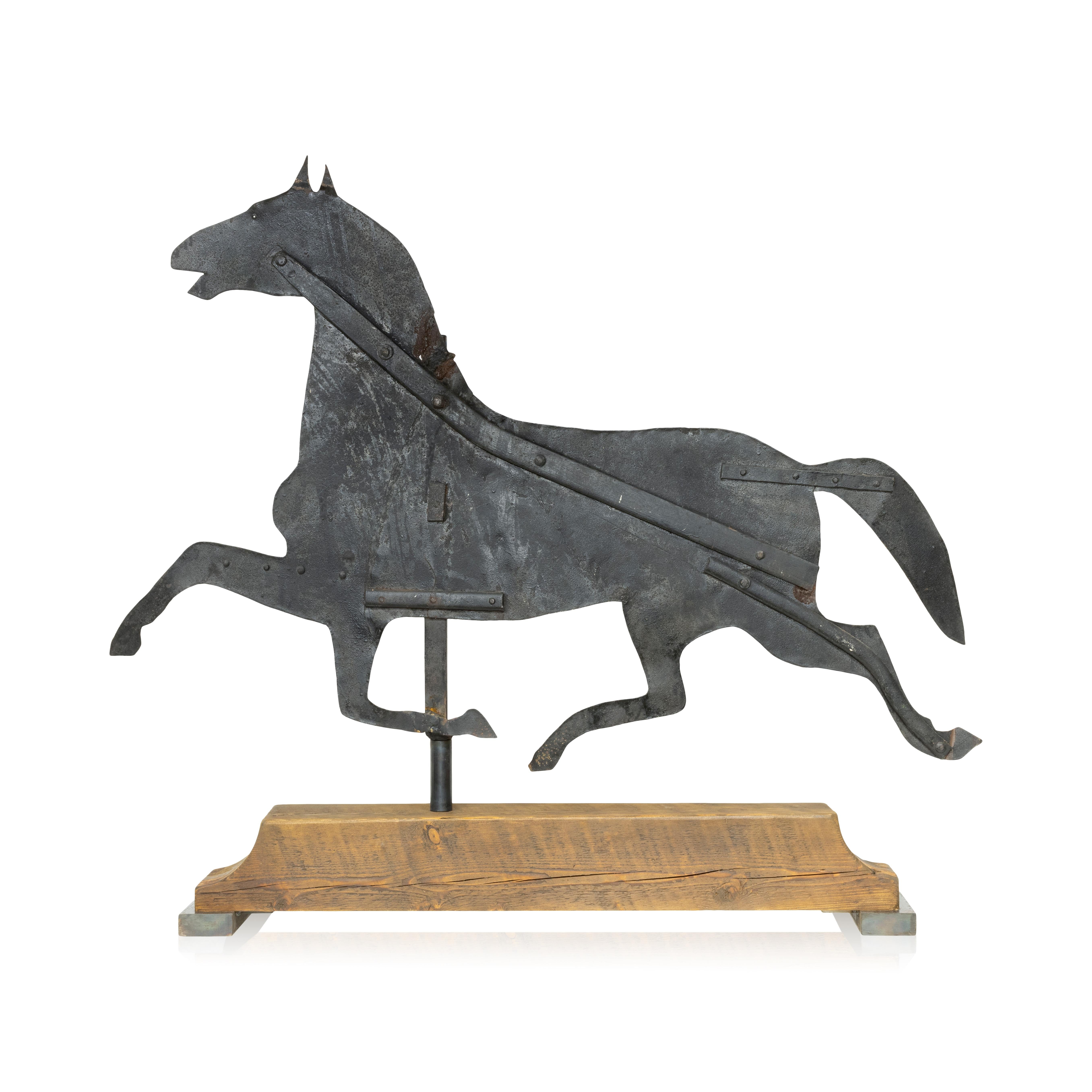 Large trotting horse weather vane/stable sign. Hand forged metal cutout figure painted black. On a more modern base. 42