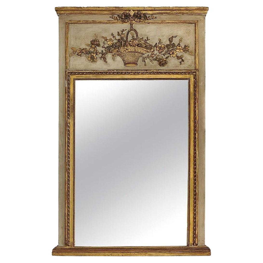 Beautiful early nineteenth century French trumeau mirror. Retaining original painted and gilded surface with very delicate and beautiful carving and a wonderful patina.
Please examine all photographs prior to purchase.
