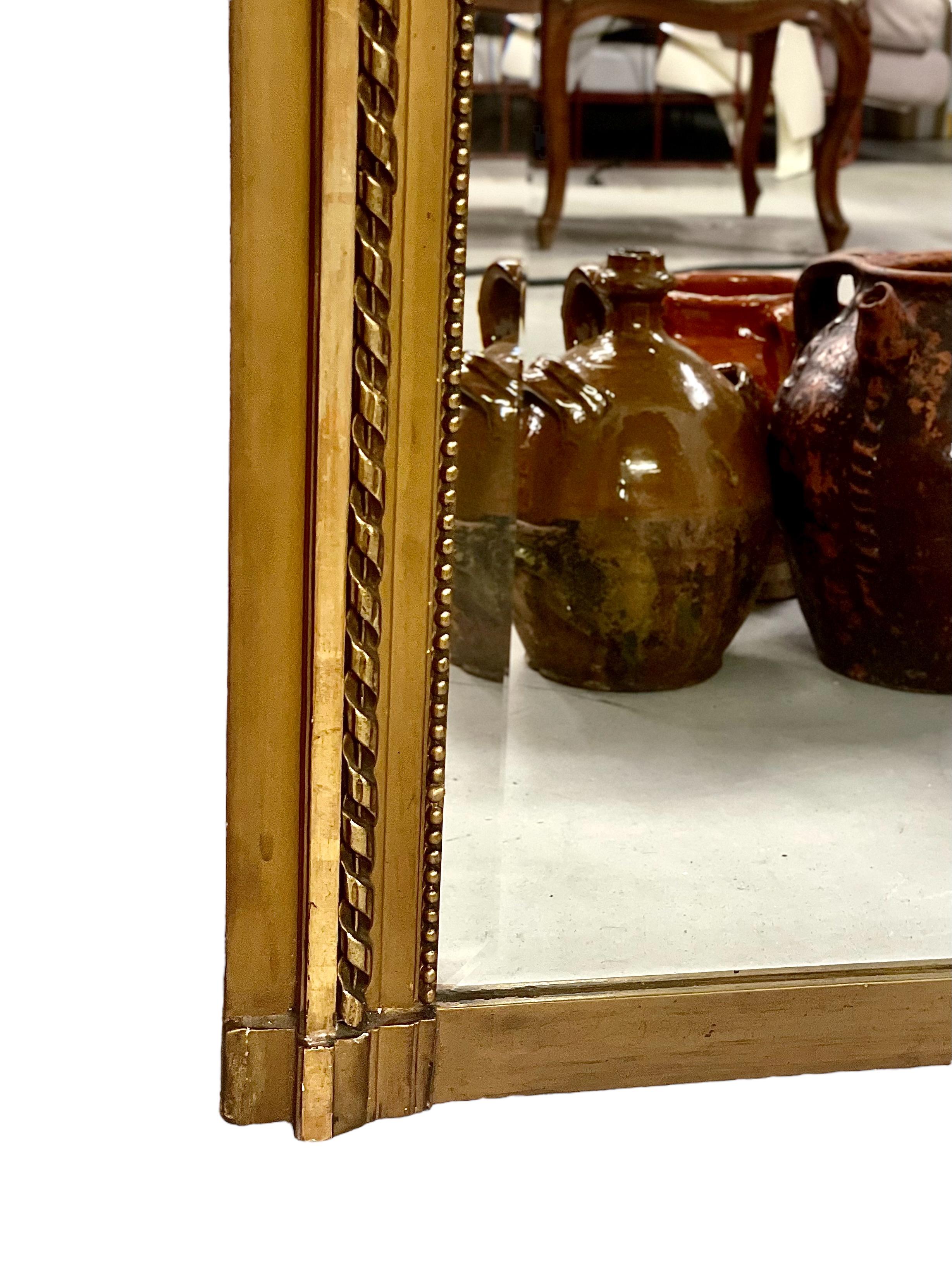 19th Century Antique Louis XVI Style Giltwood Trumeau Mirror For Sale