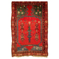 Türkischer anatolischer Dorfteppich des 19. Jahrhunderts in Rot, Grün und Blau