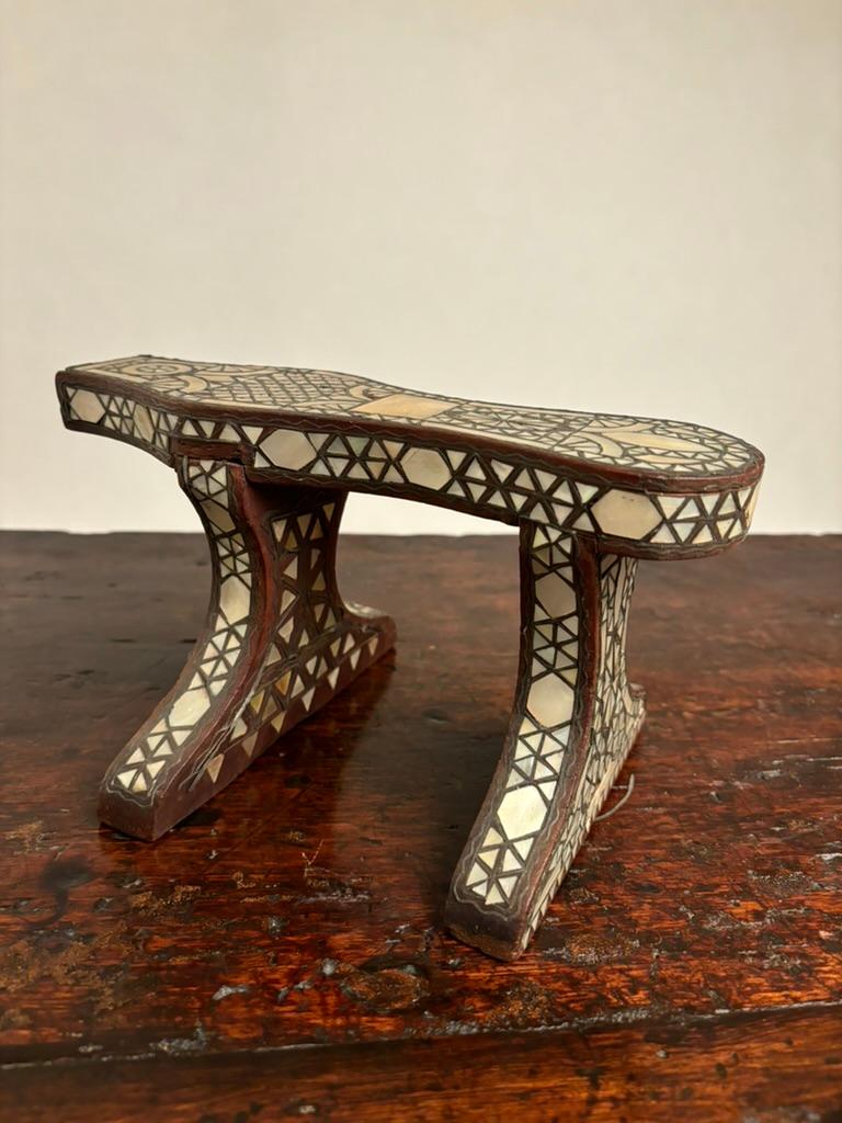 19th century Turkish bath clog, or Nalin, walnut with mother of pearl and silver wire inlay. Ottoman Empire, worn to the public bath houses or Hammam. The purpose of the elevated platform design is to keep one's feet above the wet floors. Nalın