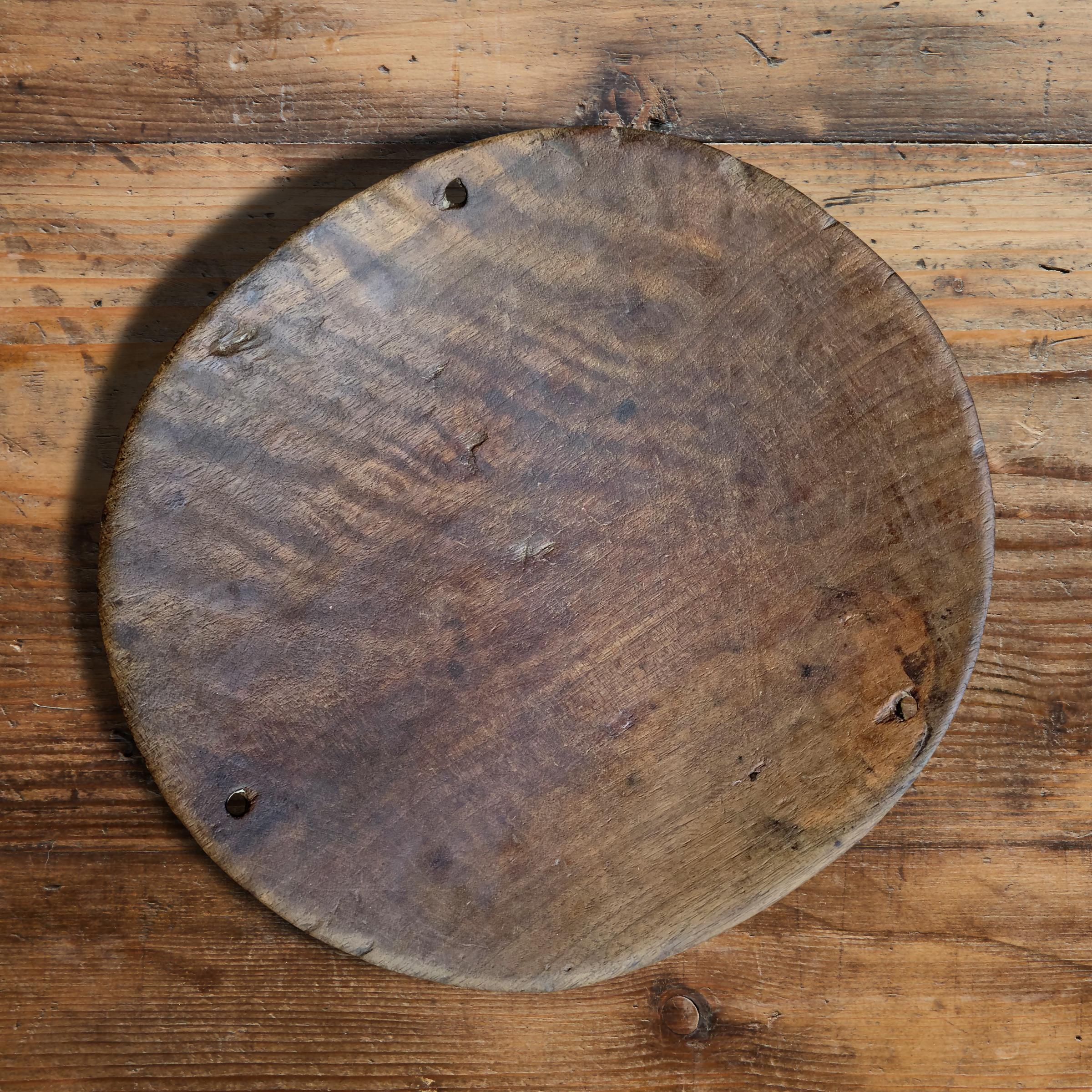 A fantastic 19th century Turkish burl wood bowl with a wonderful patina. Originally part of a scale where two of these bowls would have been used to weigh vegetables, spices, or other foodstuffs in a market, but now functions as a beautiful bowl to