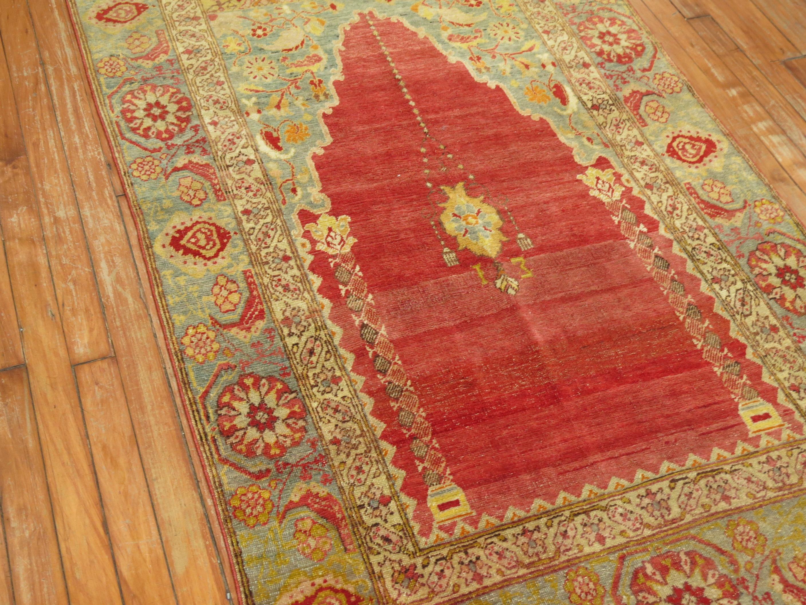 A superfine late 19th-century Turkish rug with a prayer niche motif.

3'5'' x 5'9''