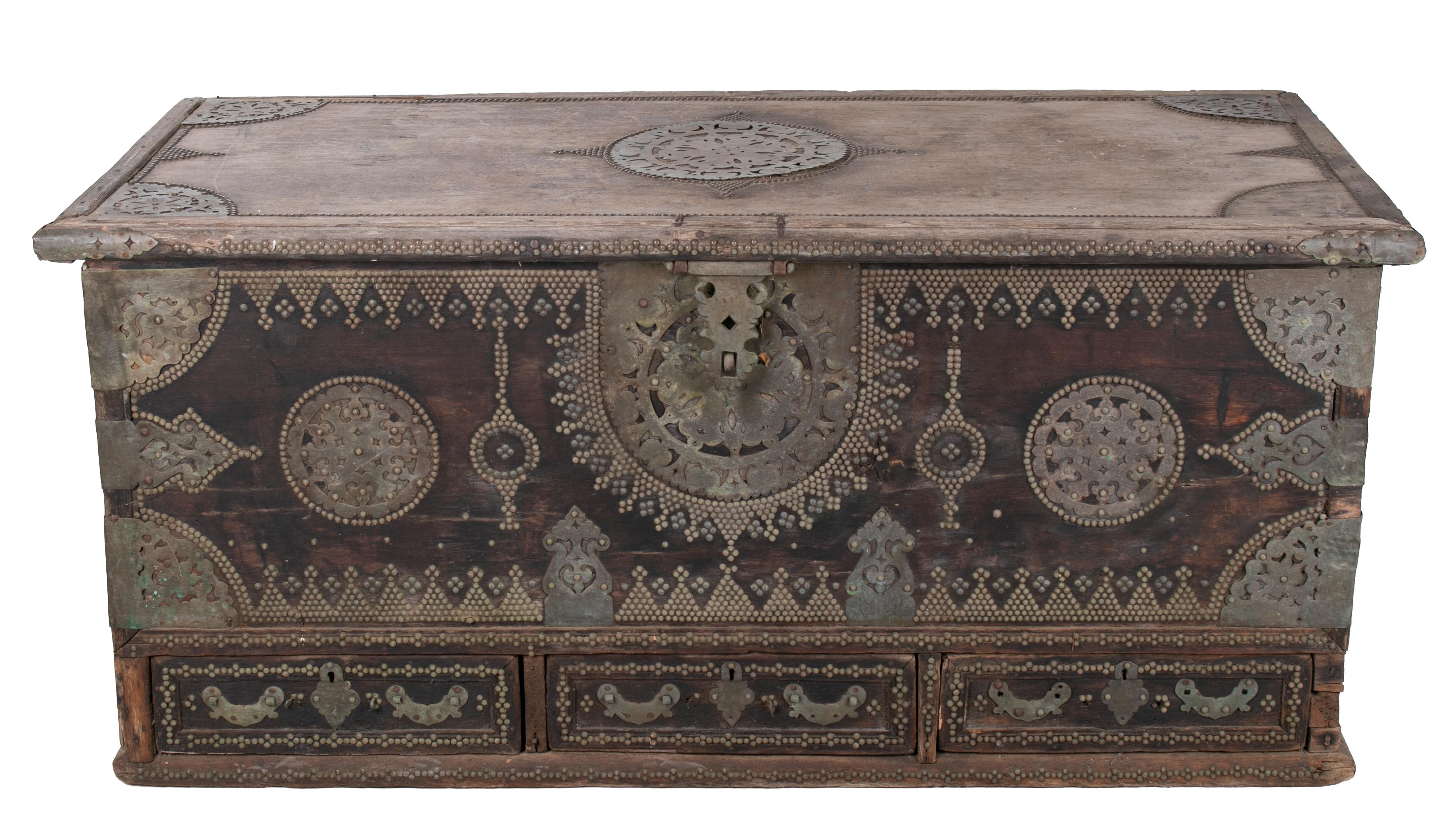 19th century Turkish wooden trunk with bronze decorations and fittings.