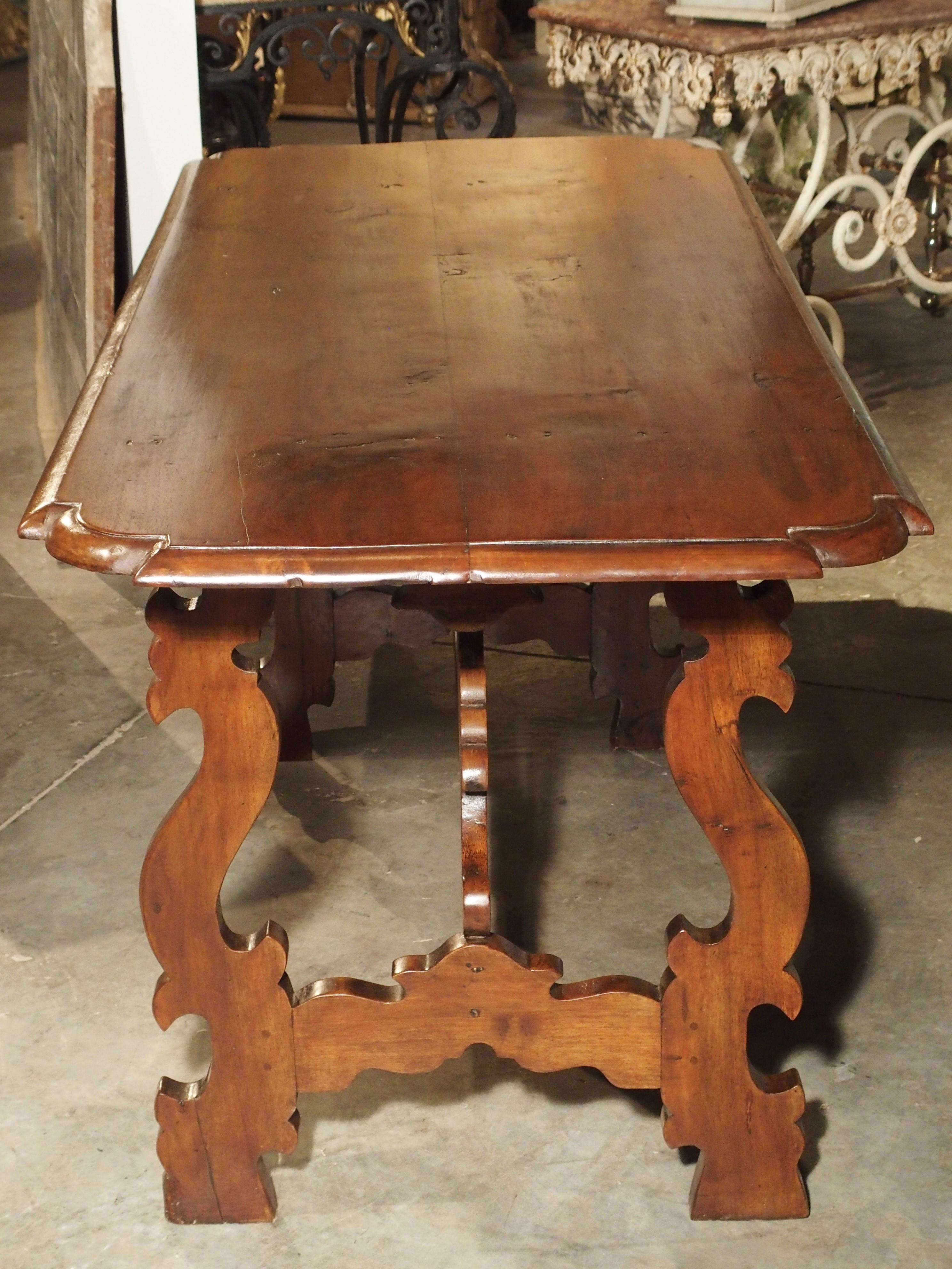 19th Century Tuscan Walnut Table with Shaped Wooden Stretchers 10