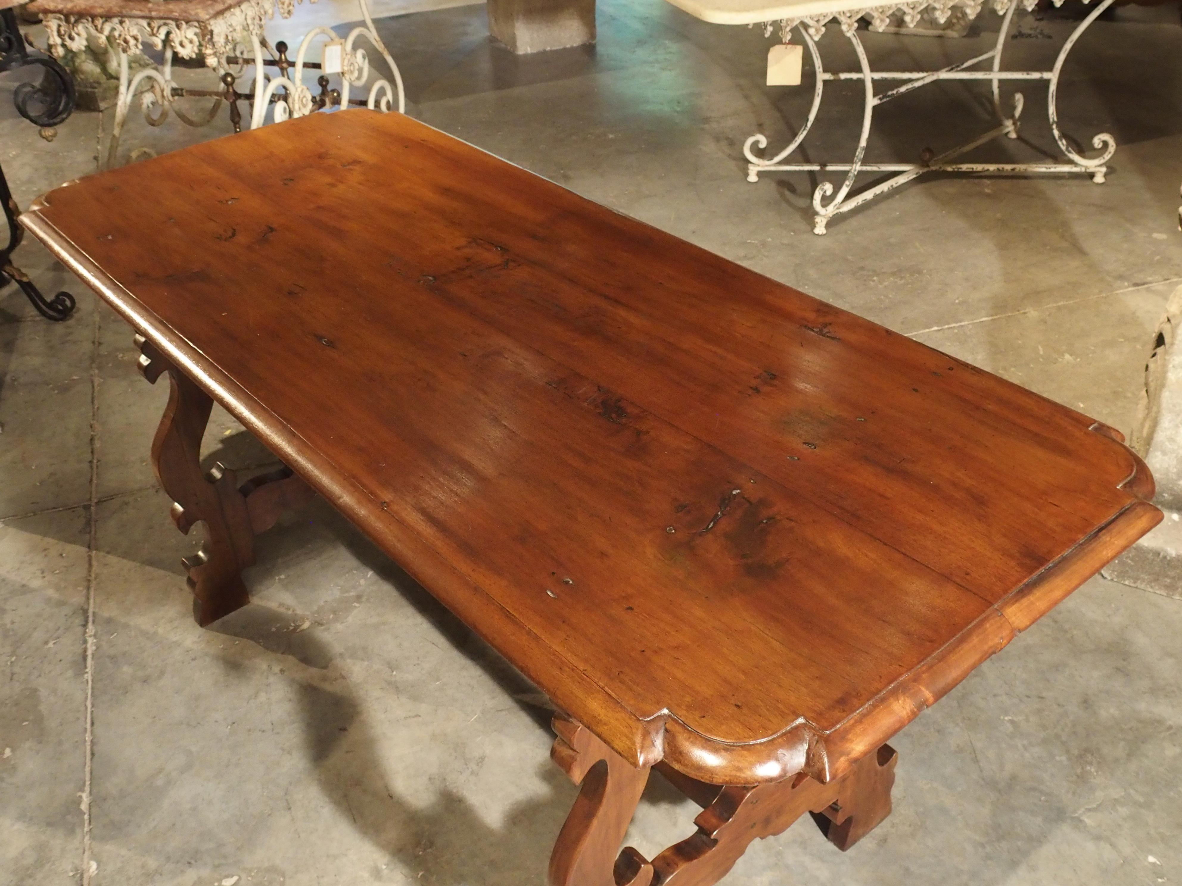 19th Century Tuscan Walnut Table with Shaped Wooden Stretchers 11