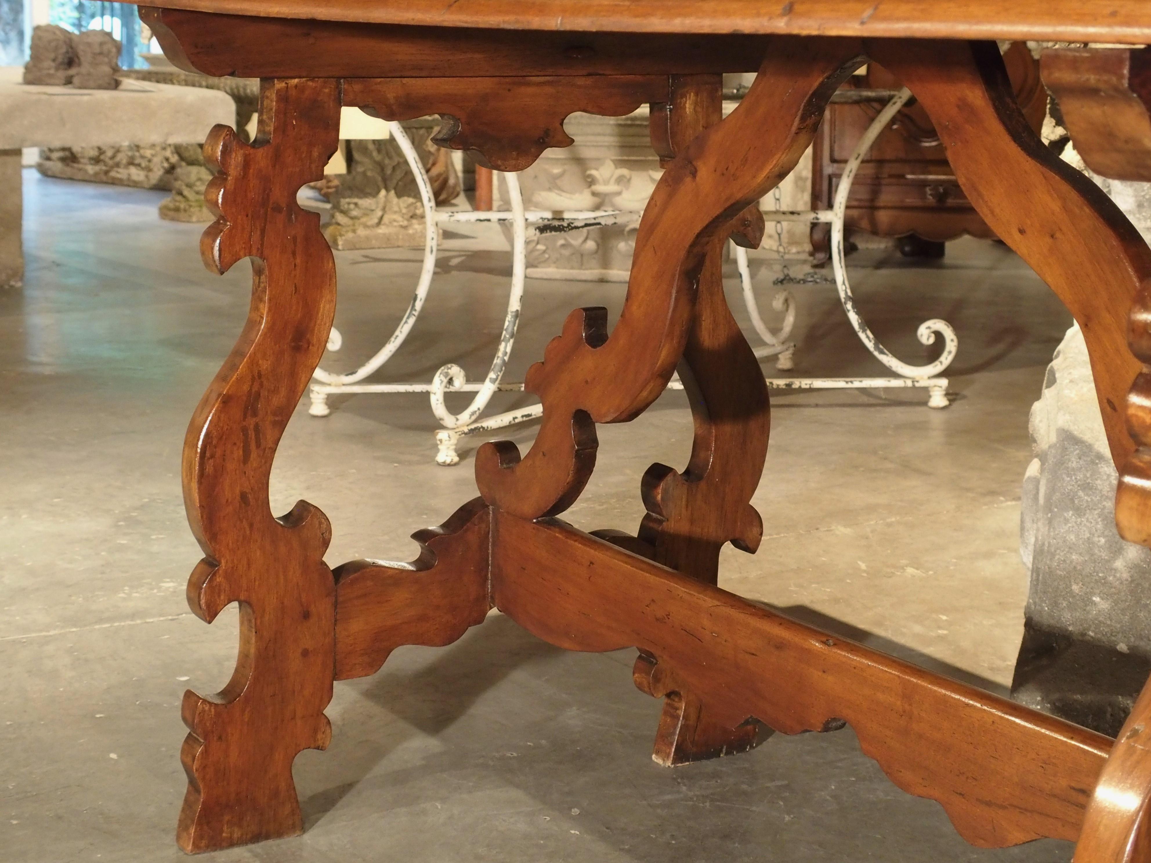 19th Century Tuscan Walnut Table with Shaped Wooden Stretchers 1