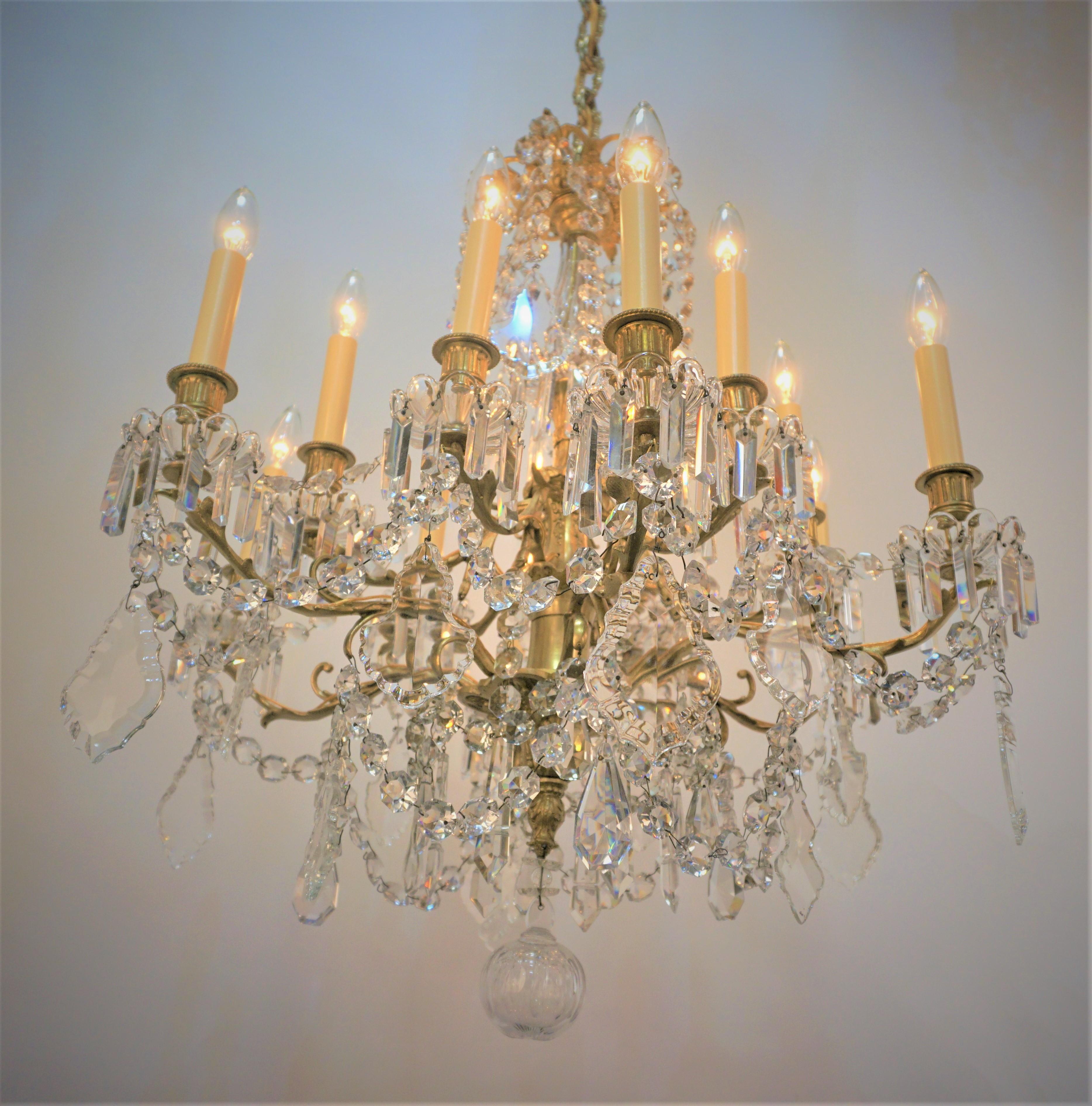 Elegant19th century twelve light Baccarat crystal and bronze chandelier.
Professionally electrified and ready for installation.
Measurement