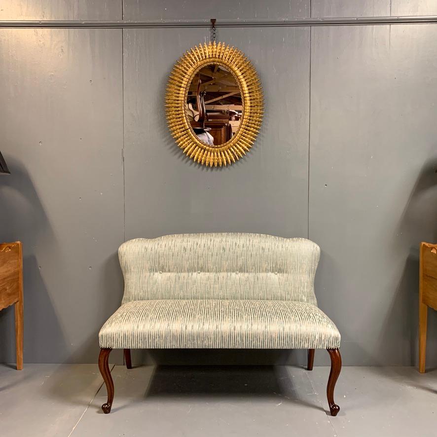 Very decorative and elegant 19th century mahogany cabriole leg window seat or two-seat occasional sofa, upholstered in a teal blue crushed velvet stripe and buttoned.
Lovely piece of furniture to give you additional seating in a living room, but
