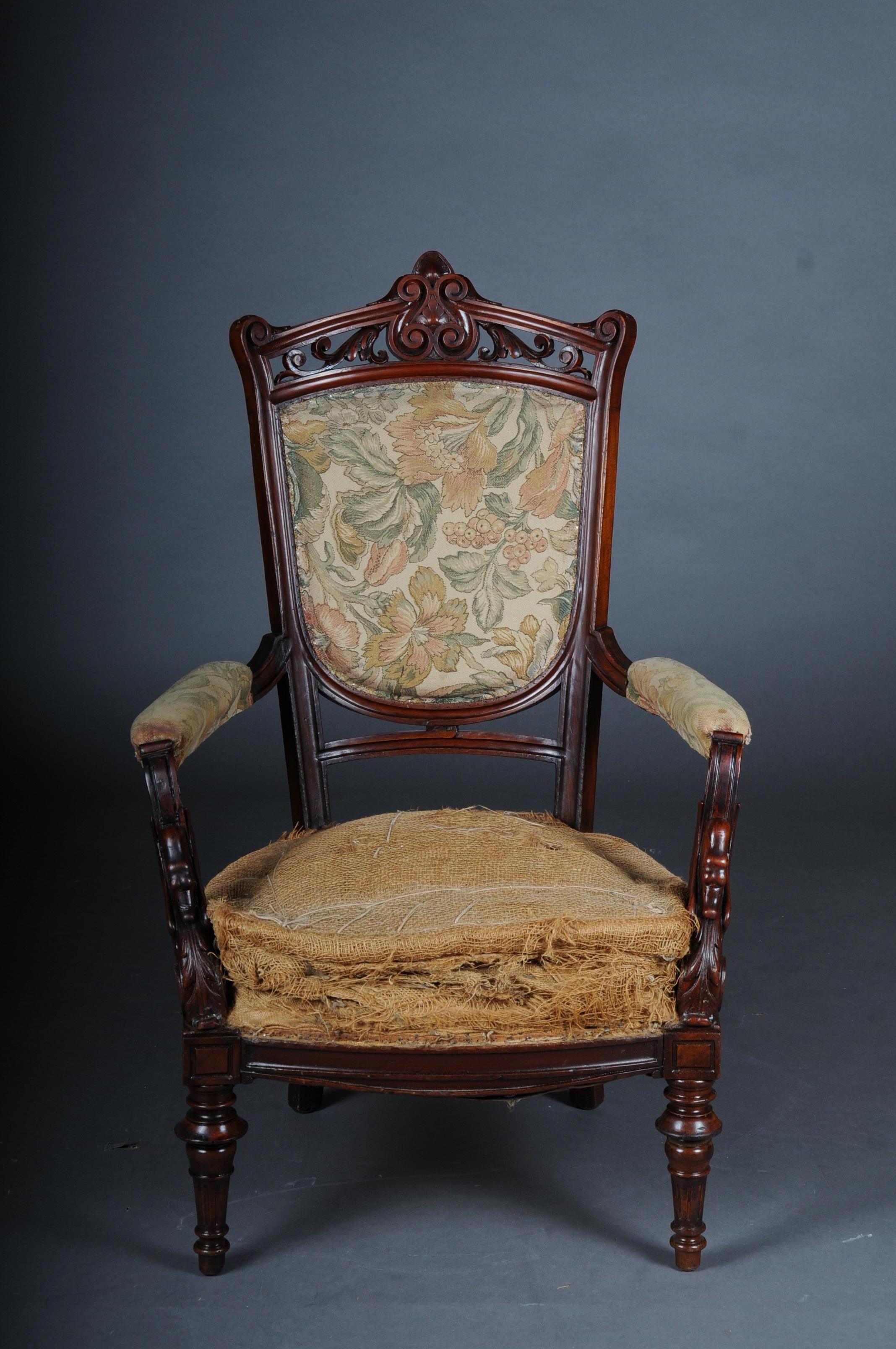 19th century Unique Empire armchair around 1820, France, Mahogany

Solid mahogany wood, France around 1820/30.
Finely carved swan's heads on each armrest. Extremely high quality and historical armchair. Classic upholstery without fabric cover.