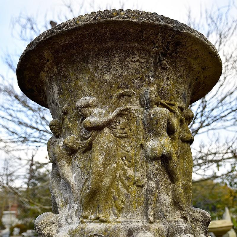A 19th century Borghese garden urn by the famous makers Austin & Seeley. Its sits of a highly decorative pedestal. Original patina.