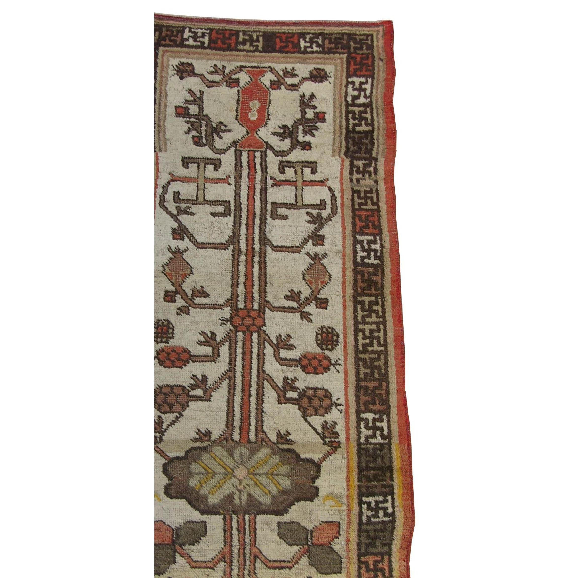 Tapis Ouzbek Khotan Samarkand du début du 19ème siècle 2'3'' X 5'9'', tribal et traditionnel, laine sur base de coton, couleur bronze, marron, beige