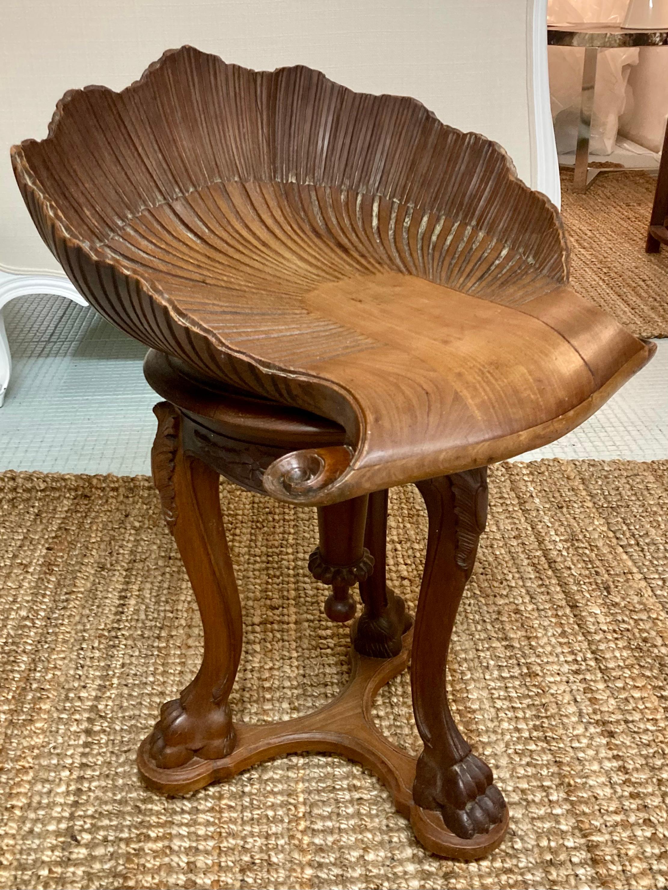 Beautiful 19th Century Venetian grotto swivel bench. Amazing carving details and gorgeous original stained wood finish. Add some Italian style to your home.