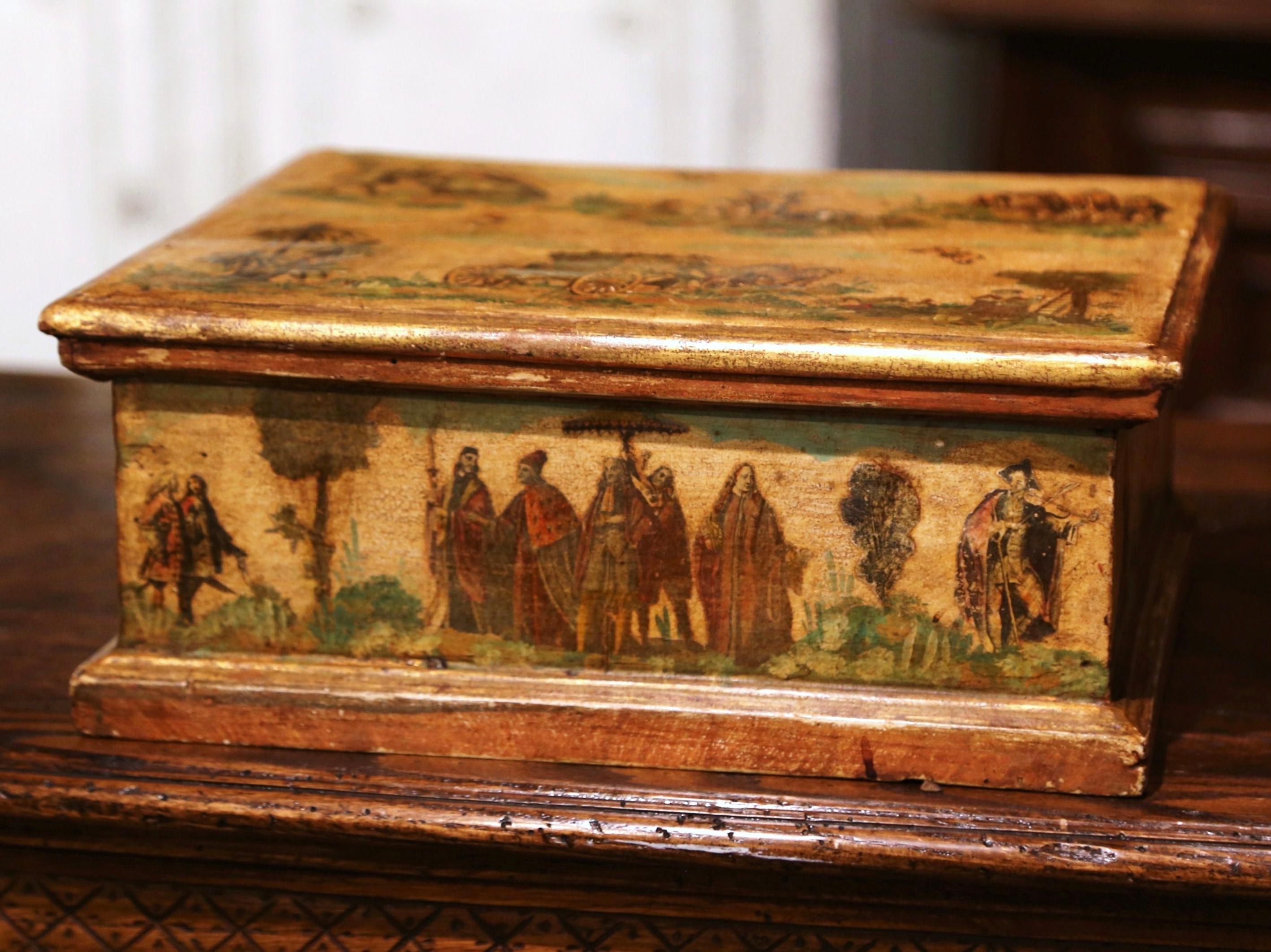 Decorate a coffee table with this elegant and colorful antique box. Crated in Venice, Italy circa 1860, the box is decorated with hand painted people scenes throughout the piece in the mustard and beige palette. The decorative box is in excellent