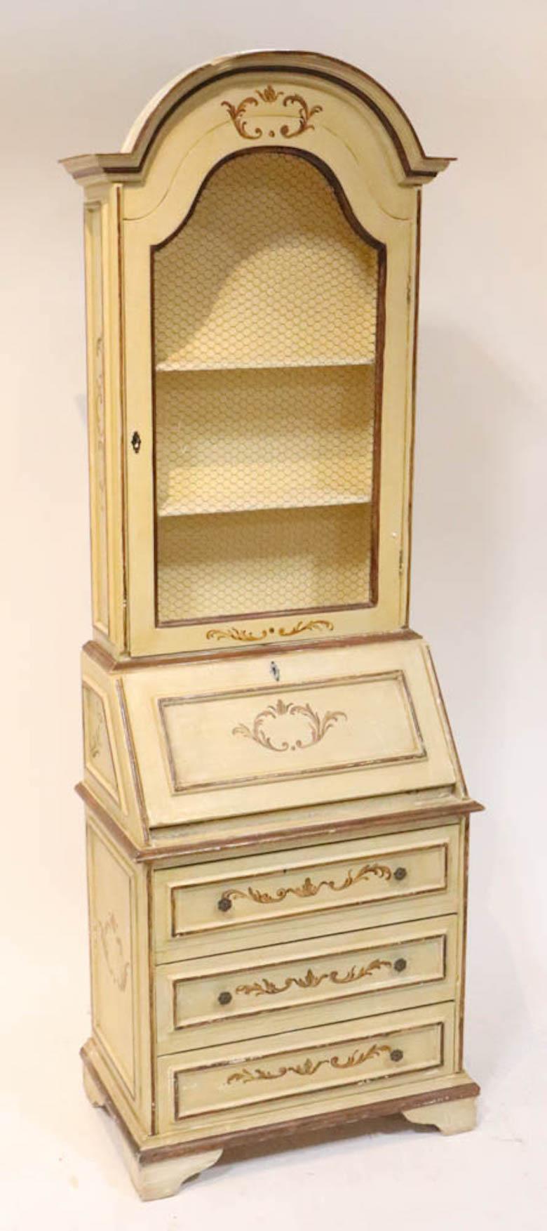 Embrace the timeless charm of this Classic Venetian Style Italian Polychrome Lacquered Hand-Painted two parts Bookcase, a piece of furniture that exudes both artistry and history. The exquisite hand-painted Venetian wreath decoration and parcel gilt