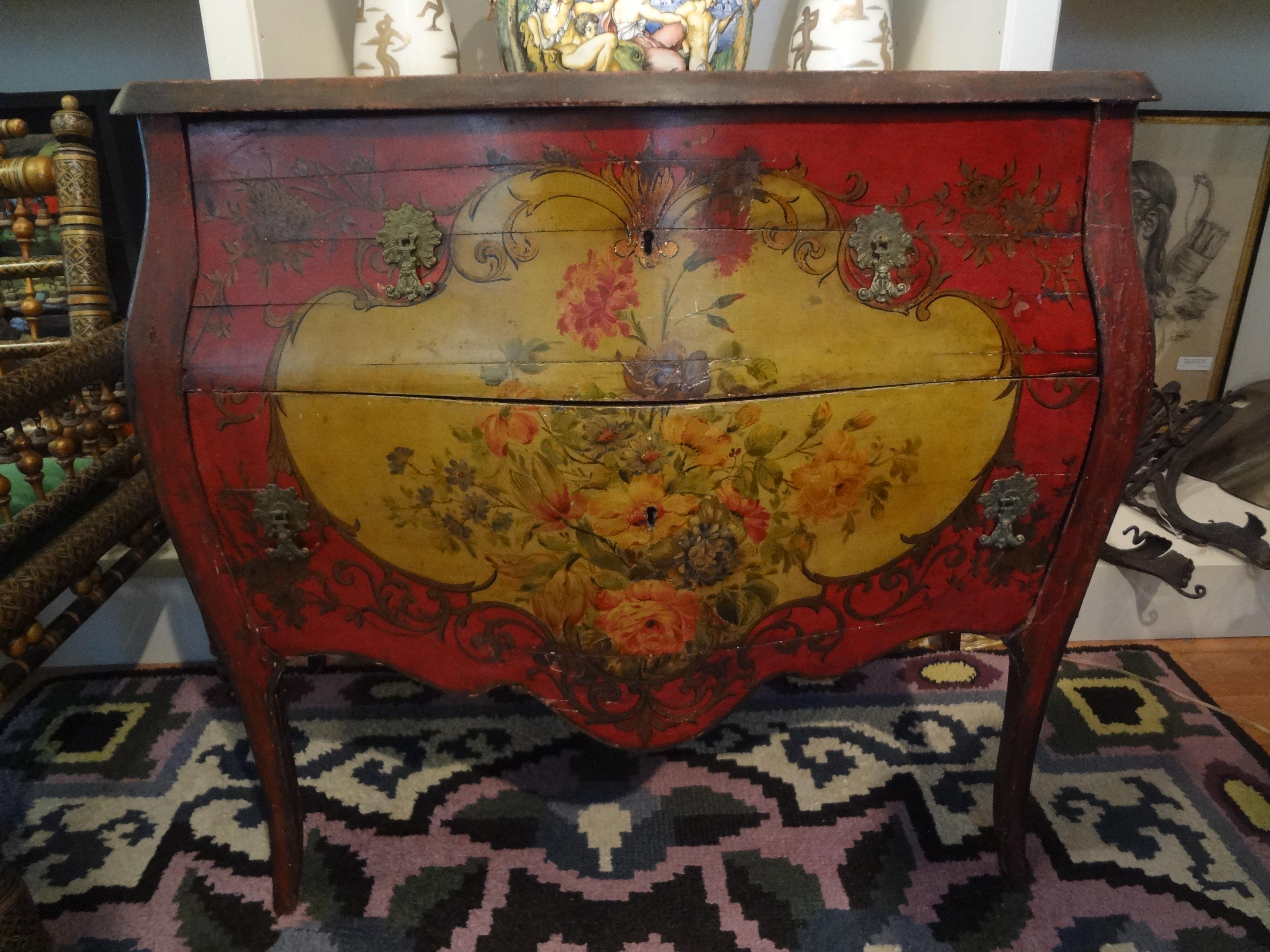 19th century Venetian painted chest or Commode.
Stunning late 19th-early 20th century Venetian Louis XV style painted two-drawer chest, credenza or commode. This Rococo chest with a lovely floral decorated front, sides and top has beautiful bronze