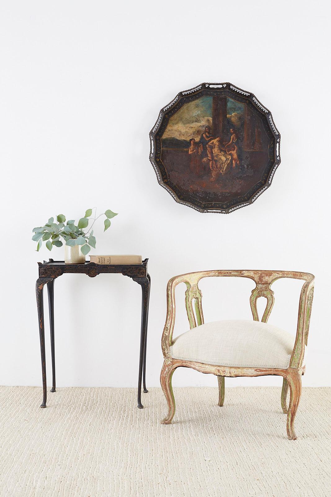 Distinctive 19th century Italian Venetian salon armchair featuring a round barrel form made in the Rococo taste. Beautifully carved ribbon frame with old lacquer remnants in a celadon color. Excellent joinery and craftsmanship with a distressed