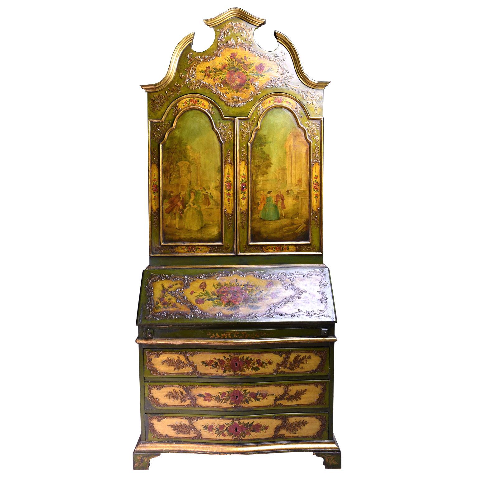 A very lovely painted green and yellow Italian fall-front secretary bookcase in the Venetian Baroque style with arched doors painted with 18th century-style scenes with figures in a garden landscape amid Roman ruins. Gold relief-work with acanthus