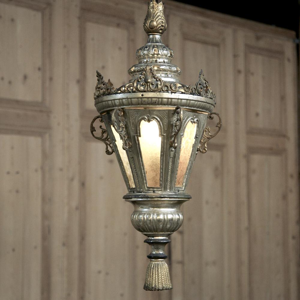 19th Century Venetian Silvered Brass Lantern Chandelier was originally designed for a large pillar candle. We have now converted it to electric lighting so you get the best of both worlds ~ Old World ambiance, craftsmanship and style melded with