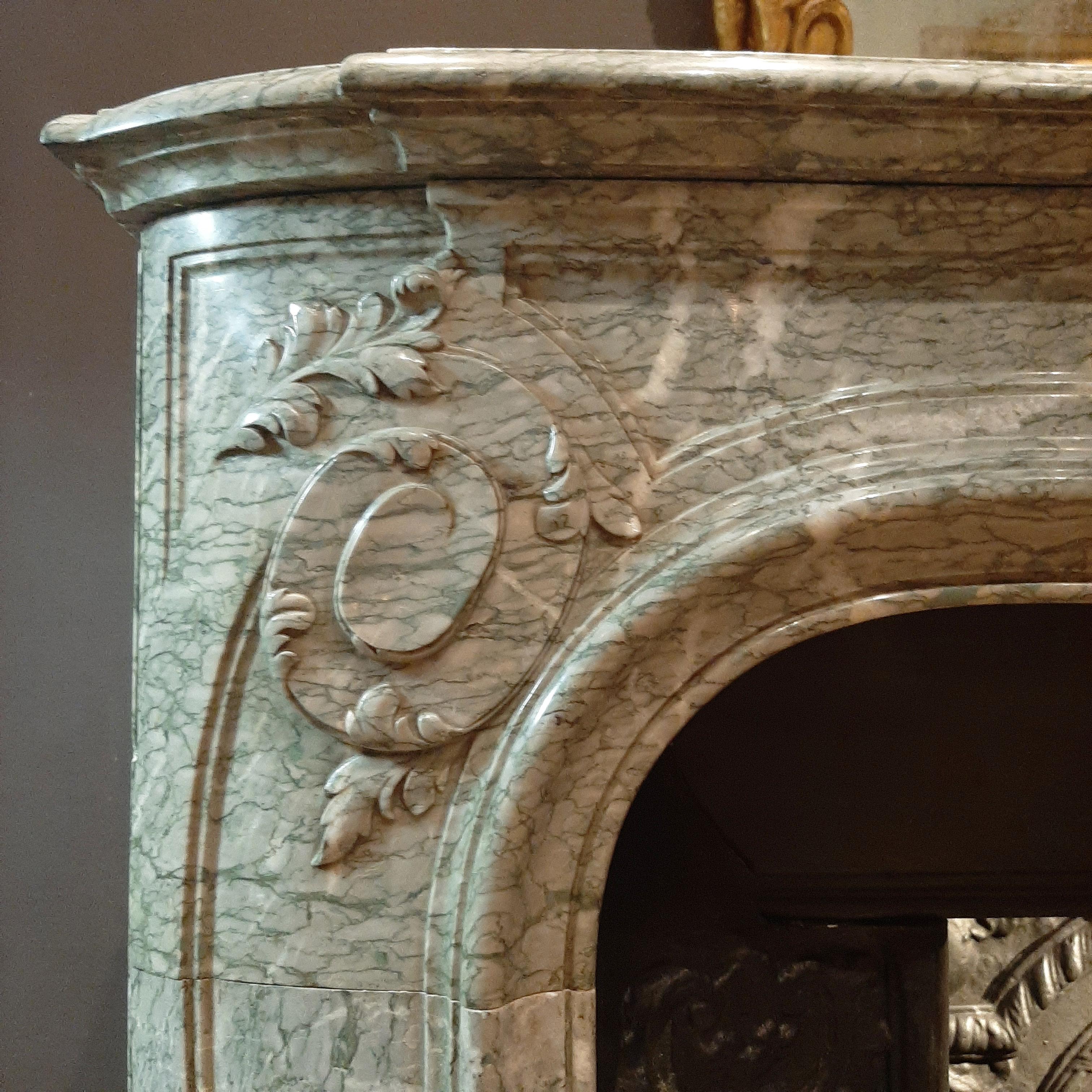 French 19th Century Vert d'Estours Marble Fireplace with Complete Cast Iron Hearth For Sale