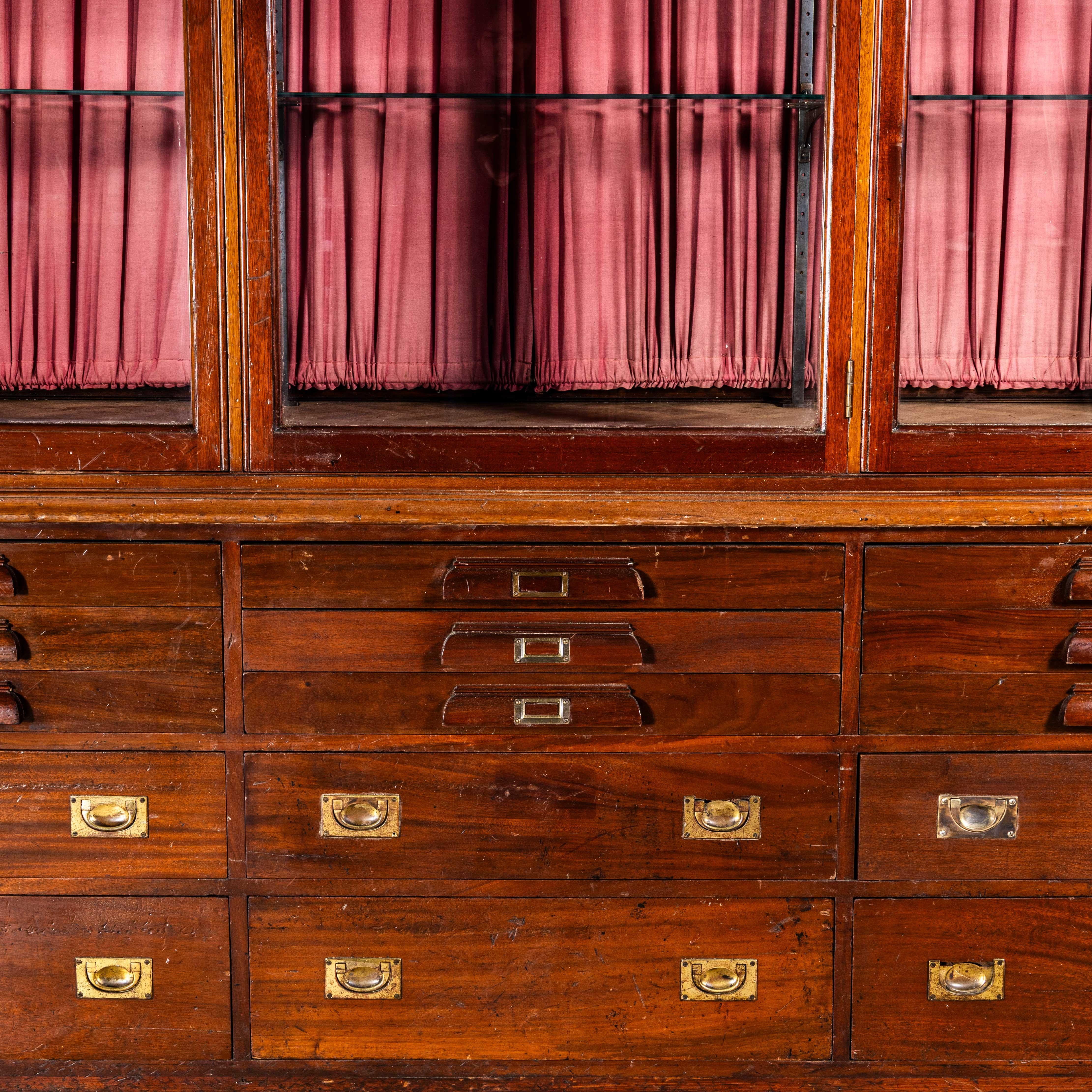 19th Century Very Large Mahogany Glazed Display Cabinet. 

A rare piece of exceptional quality that is increasingly hard to find. Made mostly of solid mahogany the main carcass and drawer fronts are mahogany and the inner carcass is pitch pine. The