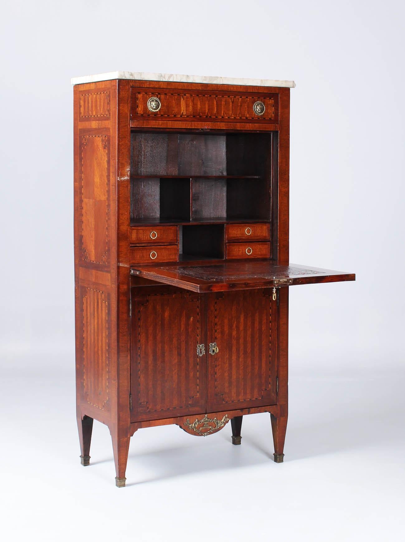 Very small secretary in Louis XVI style with fine marquetry

France
rosewood, mahogany and others
Louis XVI style, circa 1890

Dimensions: H x W x D: 141 x 71 x 37 cm

Description:
Straight-lined secretaire in rosewood veneer with a strict